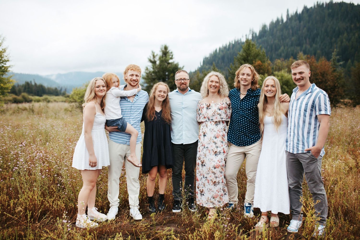 Family group standing together for portraits in Cascade Idaho