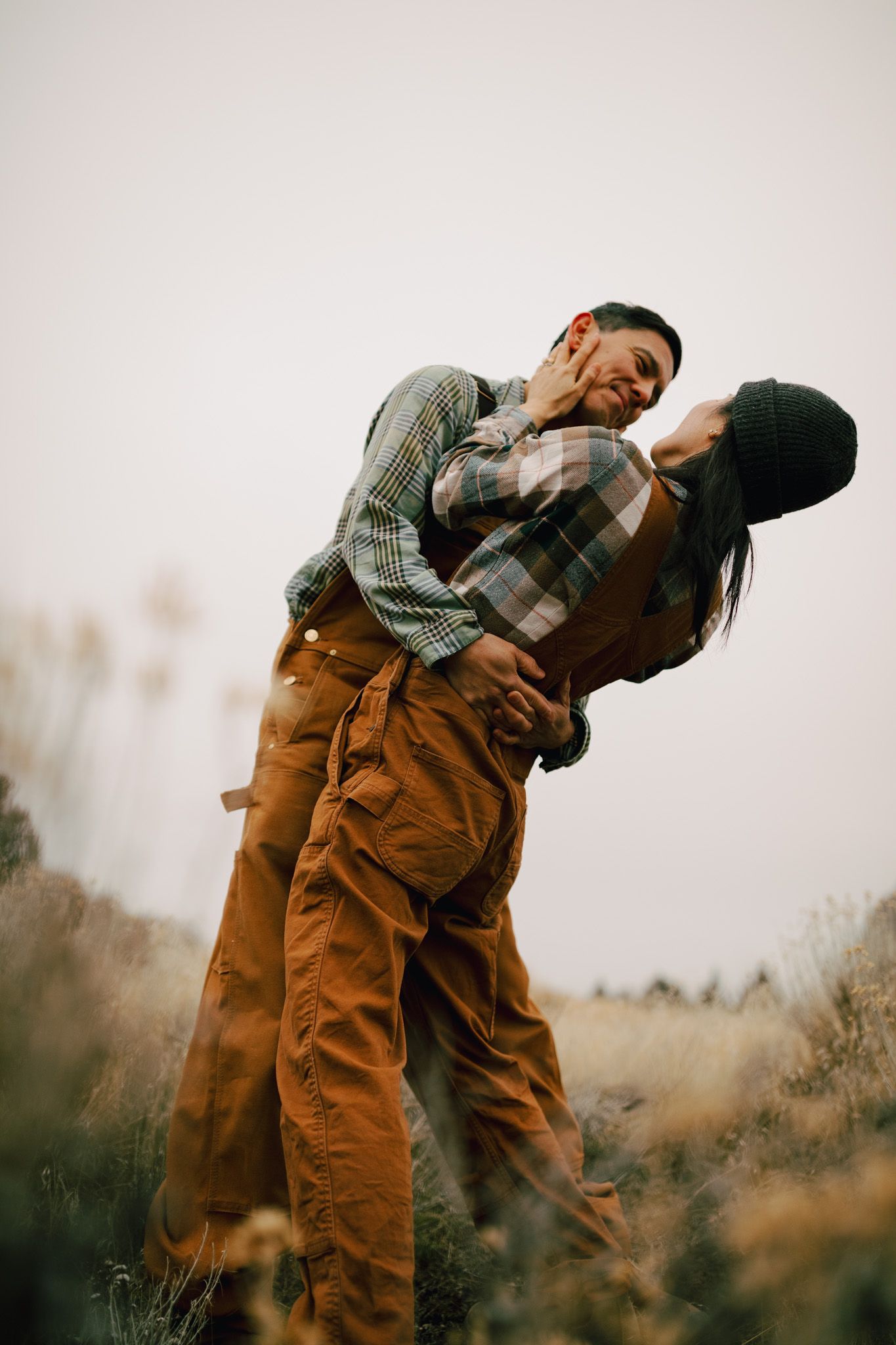 couple standing together dancing for a couples photoshoot