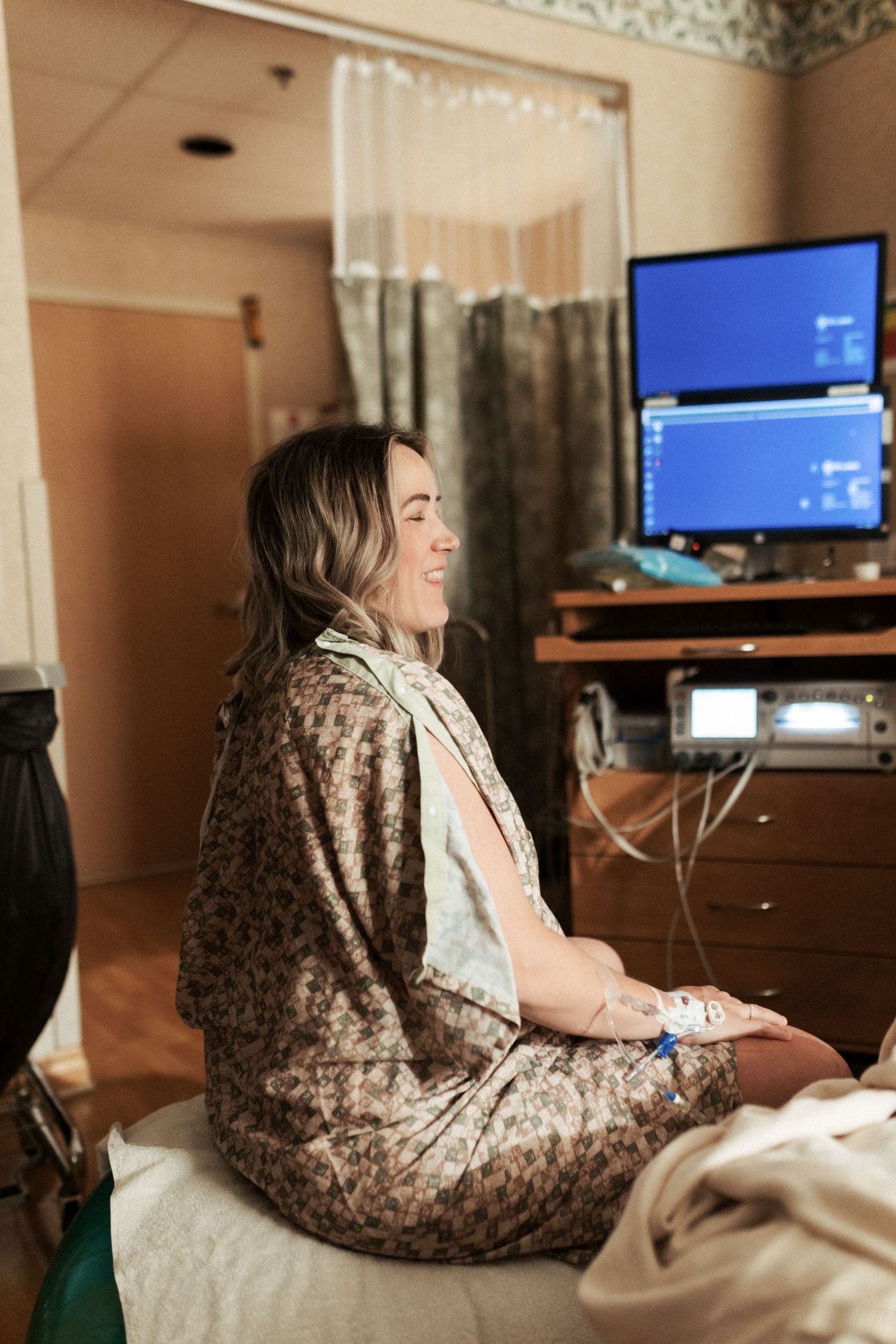 Birth photography of a mom holding her newborn in Boise