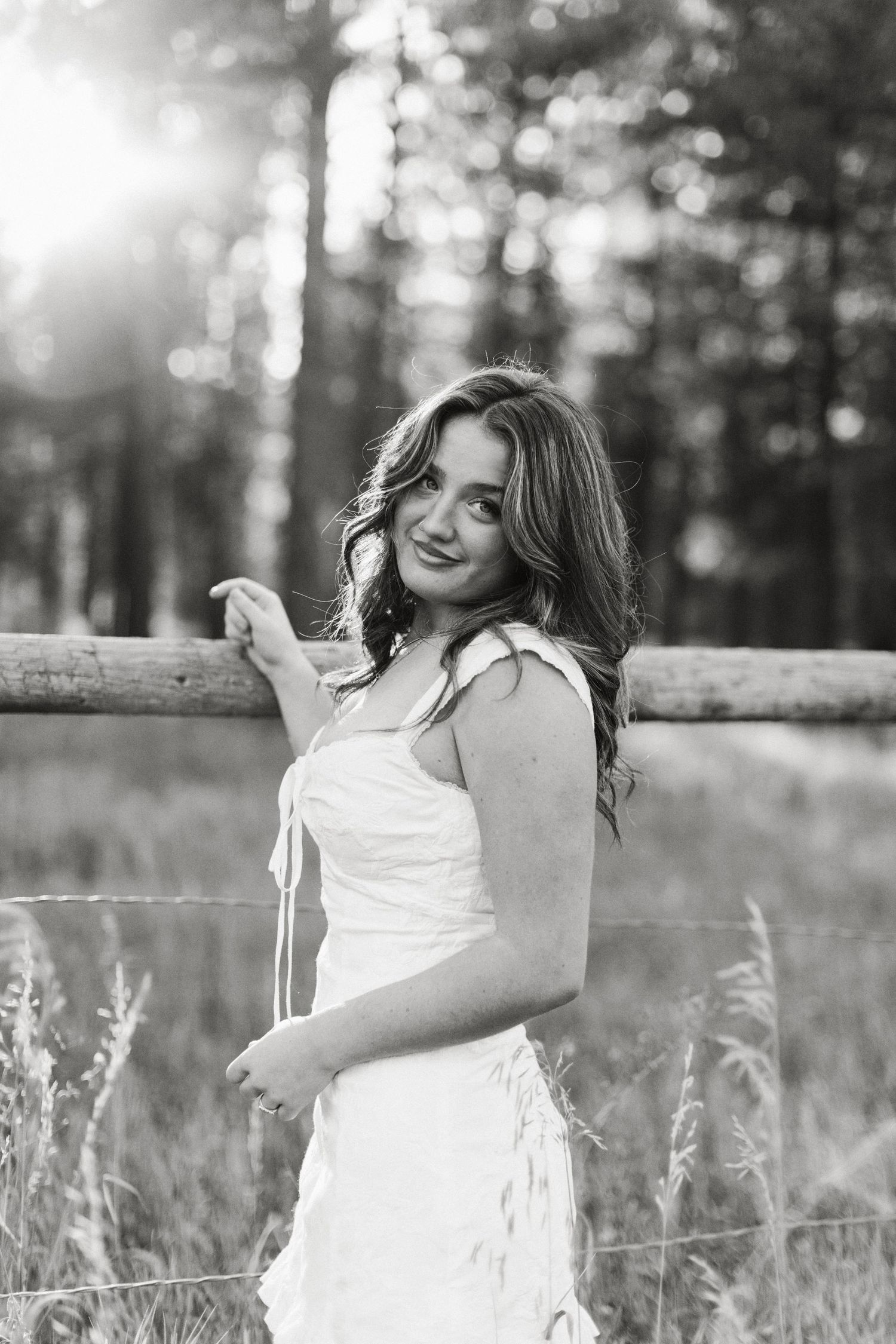 Black and white senior portrait of young woman near Boise