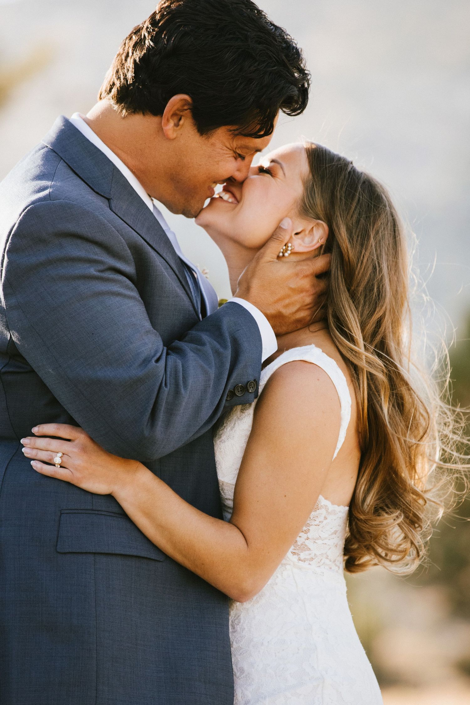 Newlyweds kissing in a photo