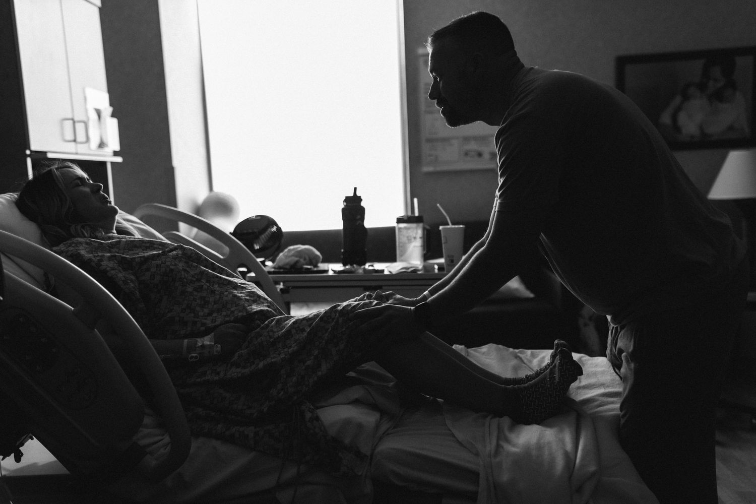 Birth photography of a mom holding her newborn in Boise