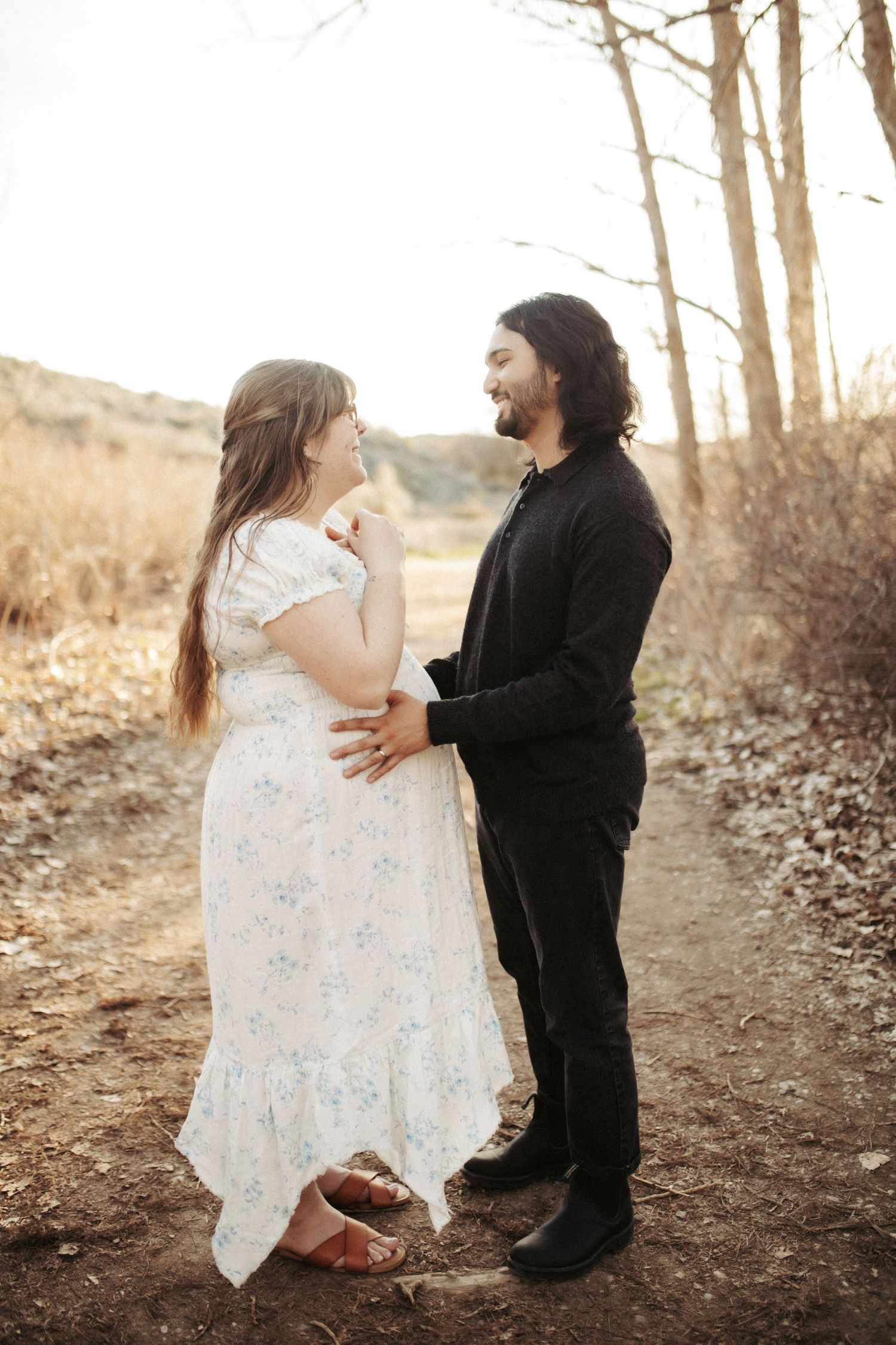 Wife and husband posing for family photos in Boise