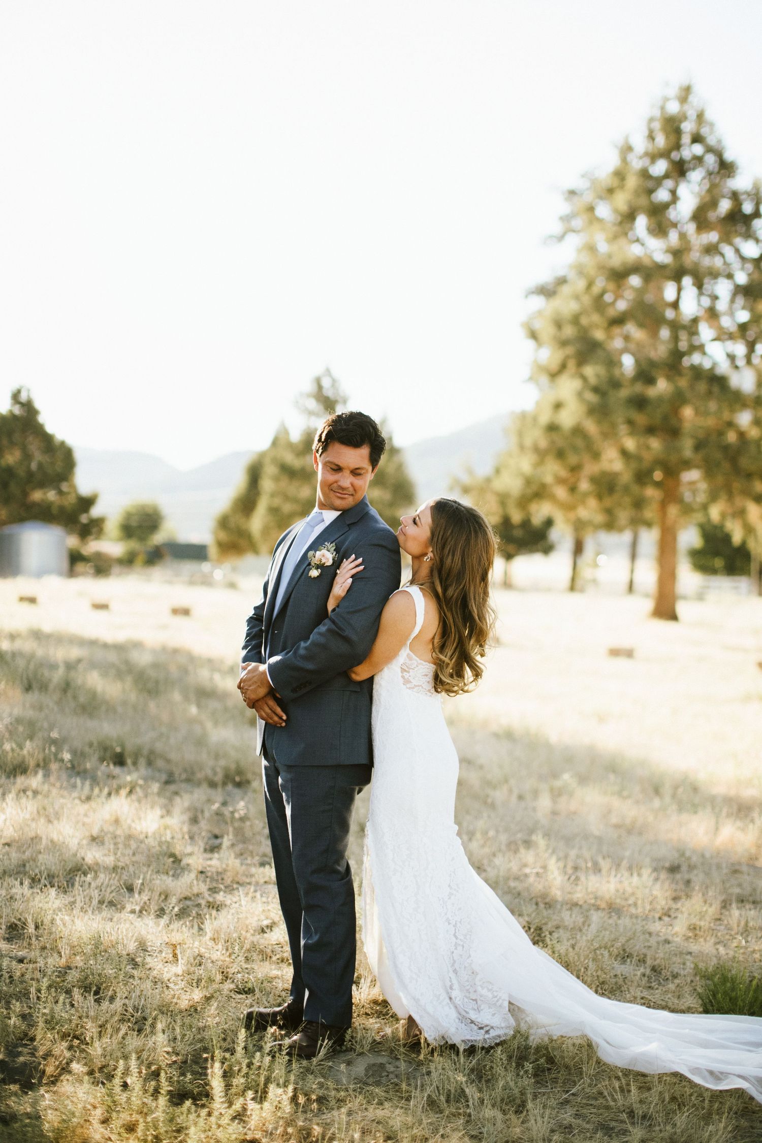 Bride and Groom standing together for portraits at Shay Meadow Ranch in Big Bear California