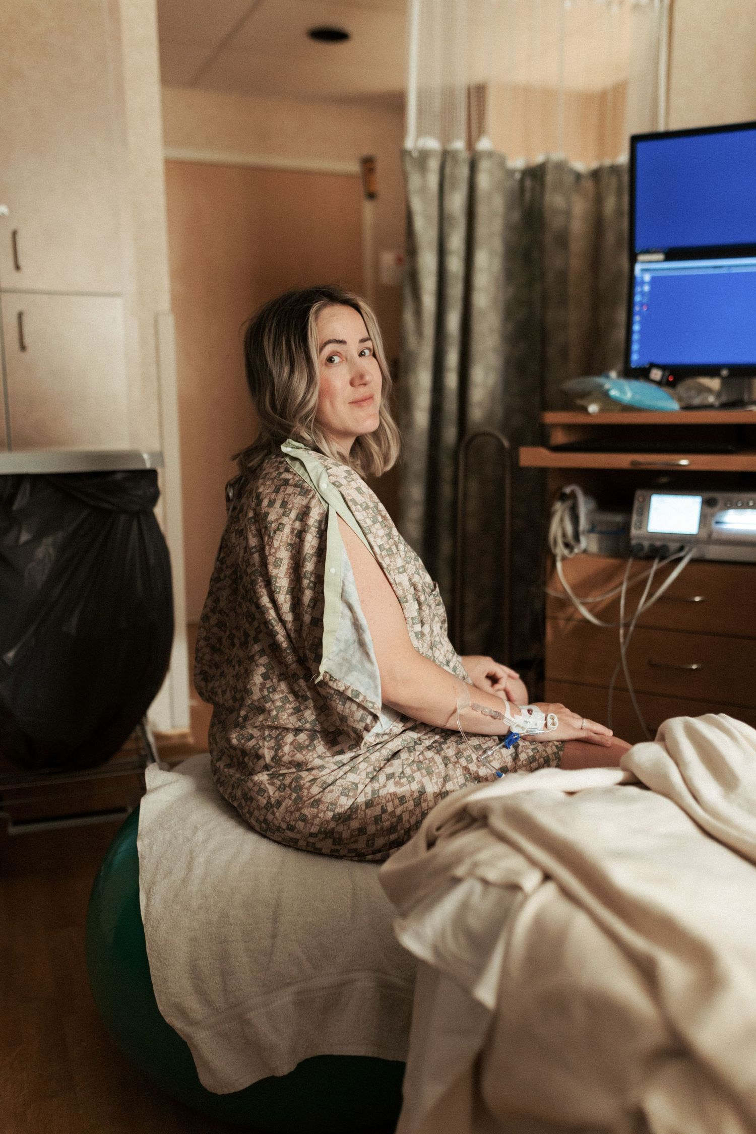 Birth photography of a mom holding her newborn in Boise