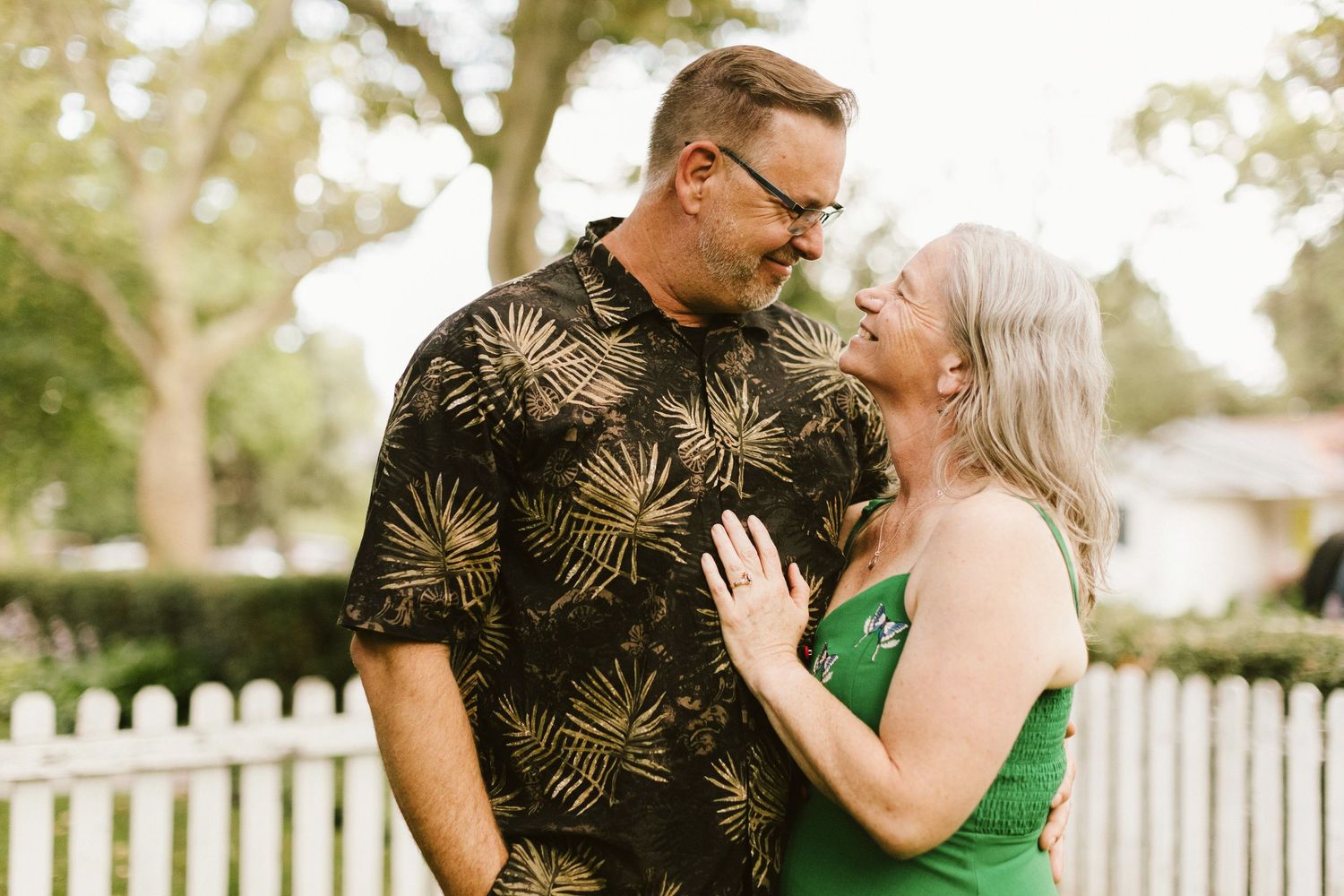 Couple posing closely together during a family photoshoot in the Boise North End
