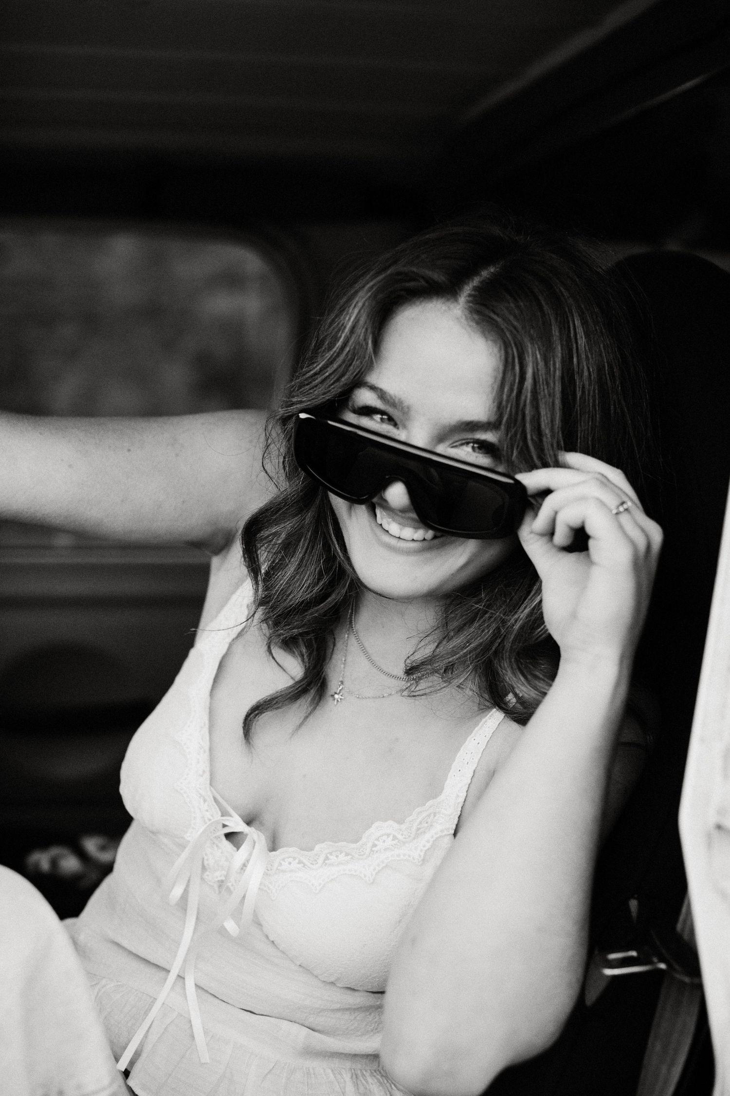 Black and white portrait of smiling young woman near Boise