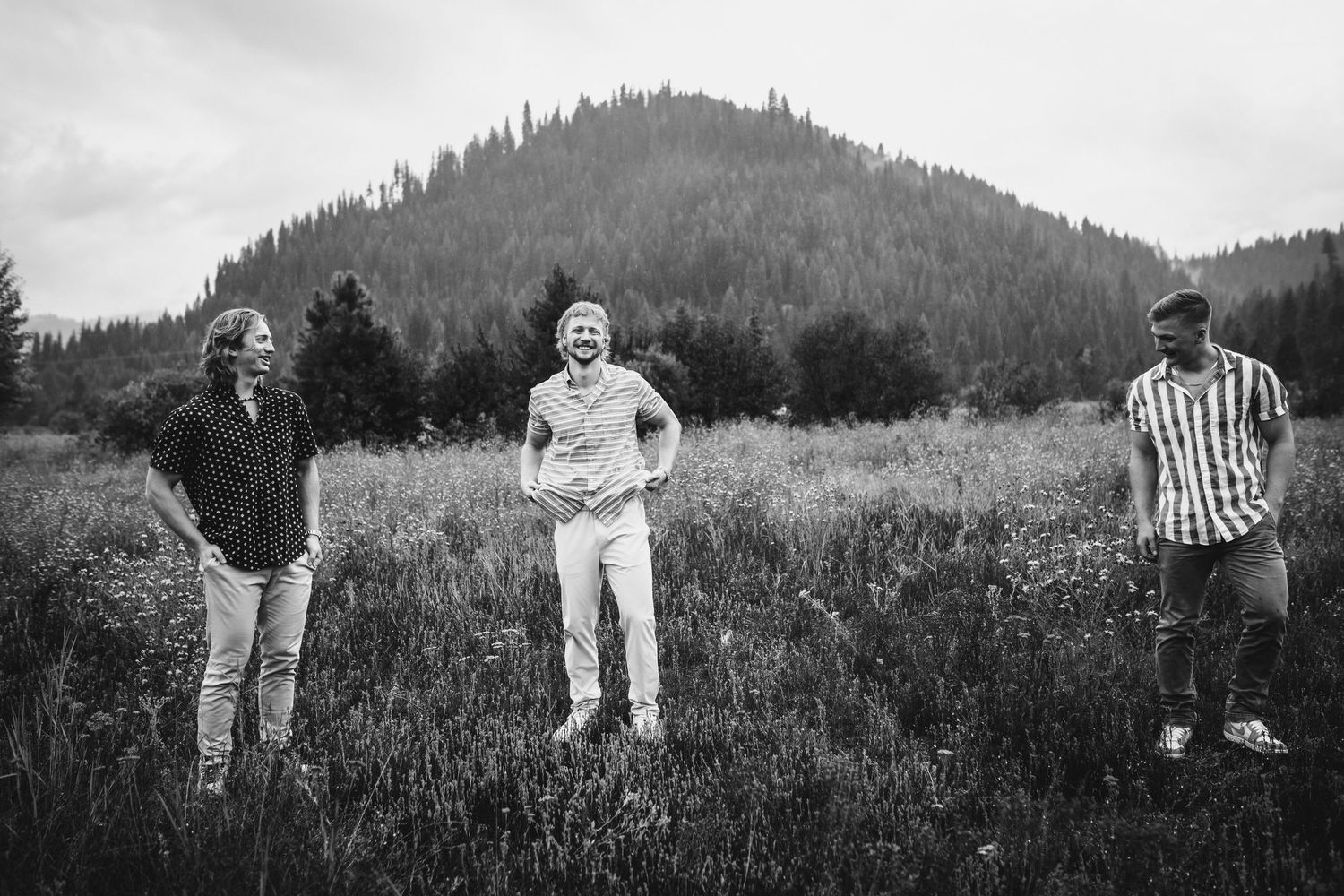 Candid black and white of sibling brothers together