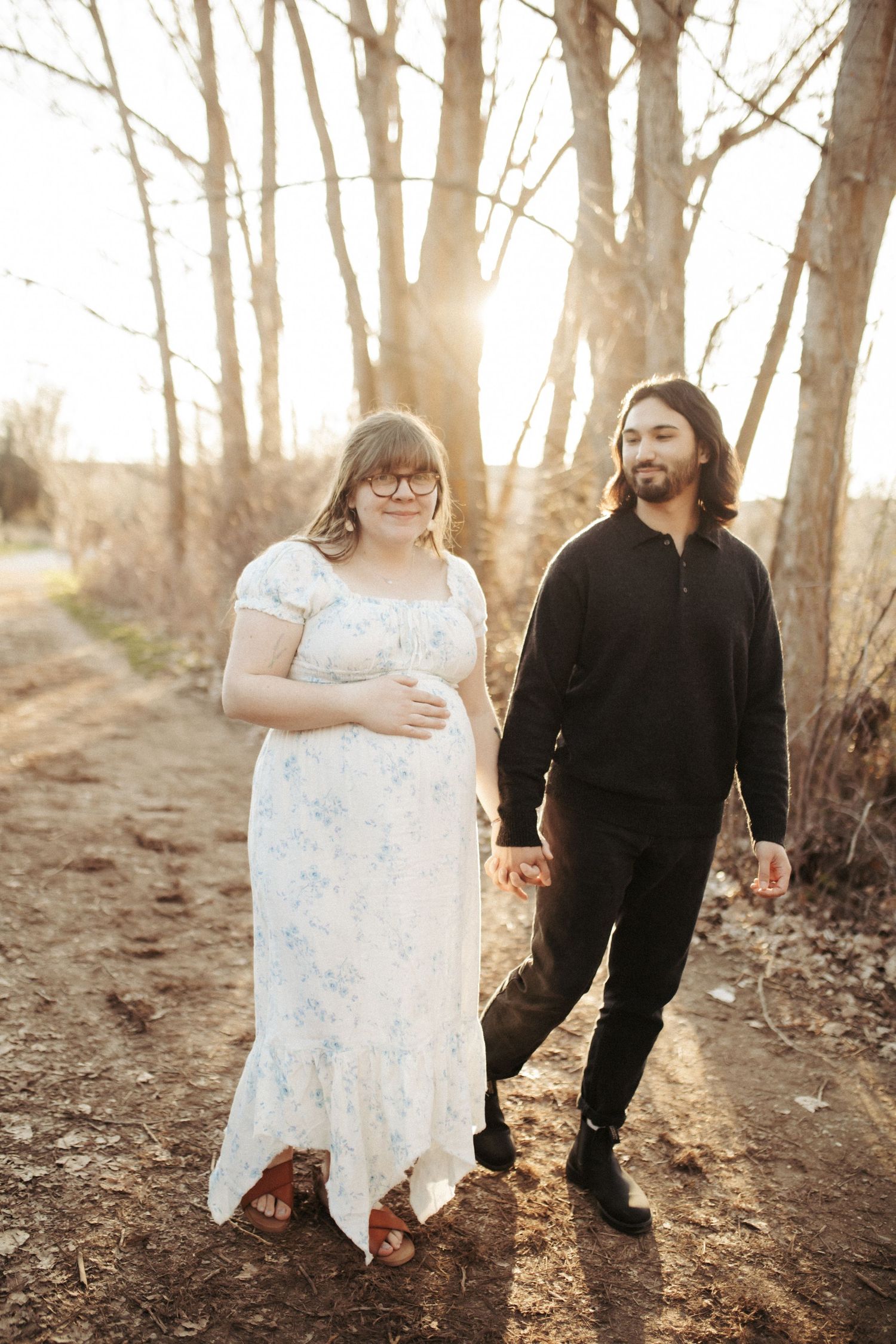 Wife and husband walking together for family photos in Boise
