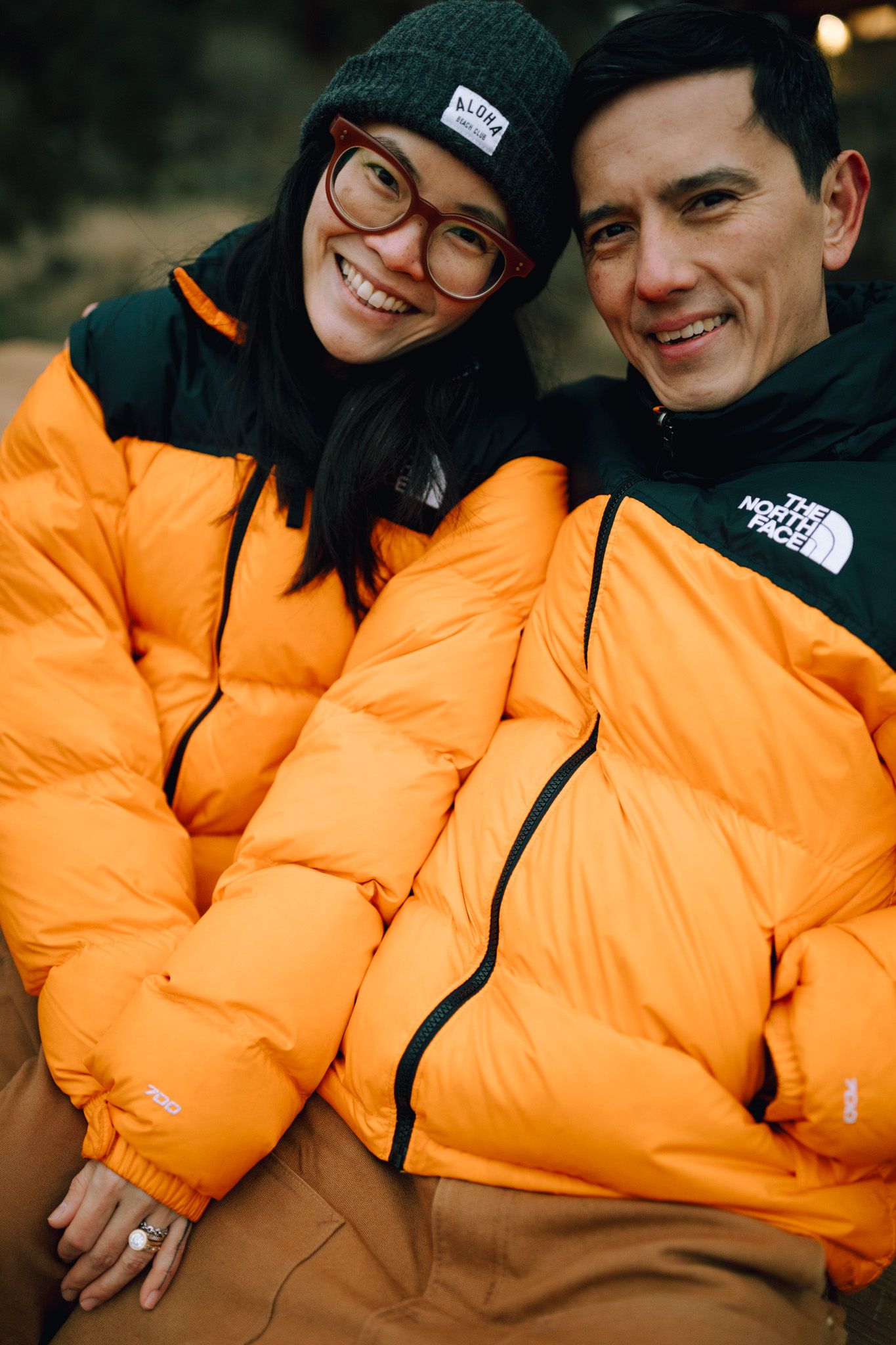 Couple sitting together smiling for photoshoot in Redmond Oregon