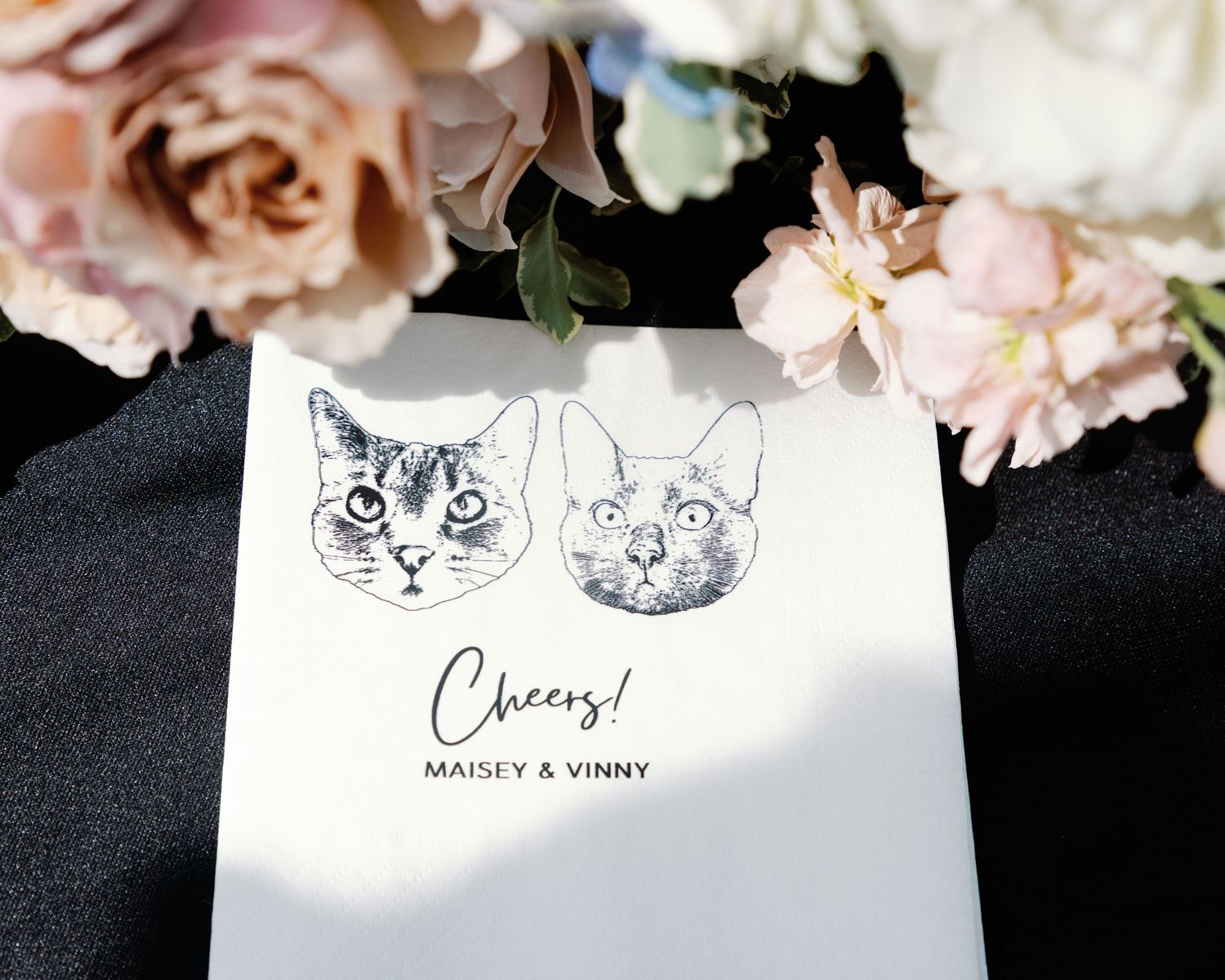 Wedding stationery featuring cute cat illustrations in black and white design.