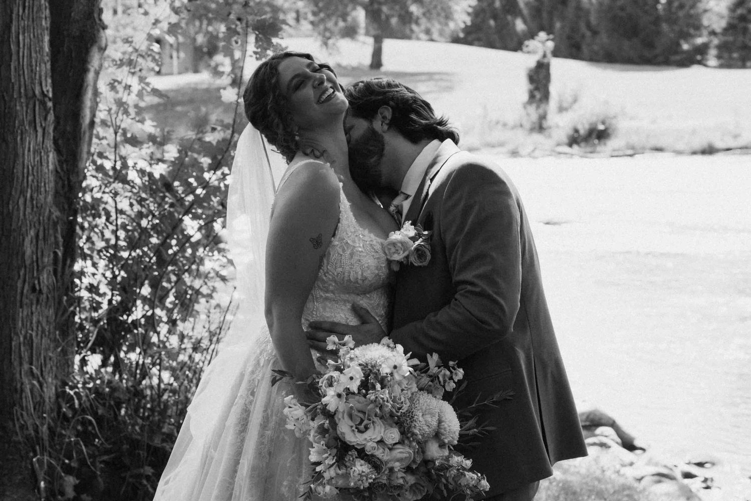 Candid wedding photography moments captured in a natural outdoor setting.