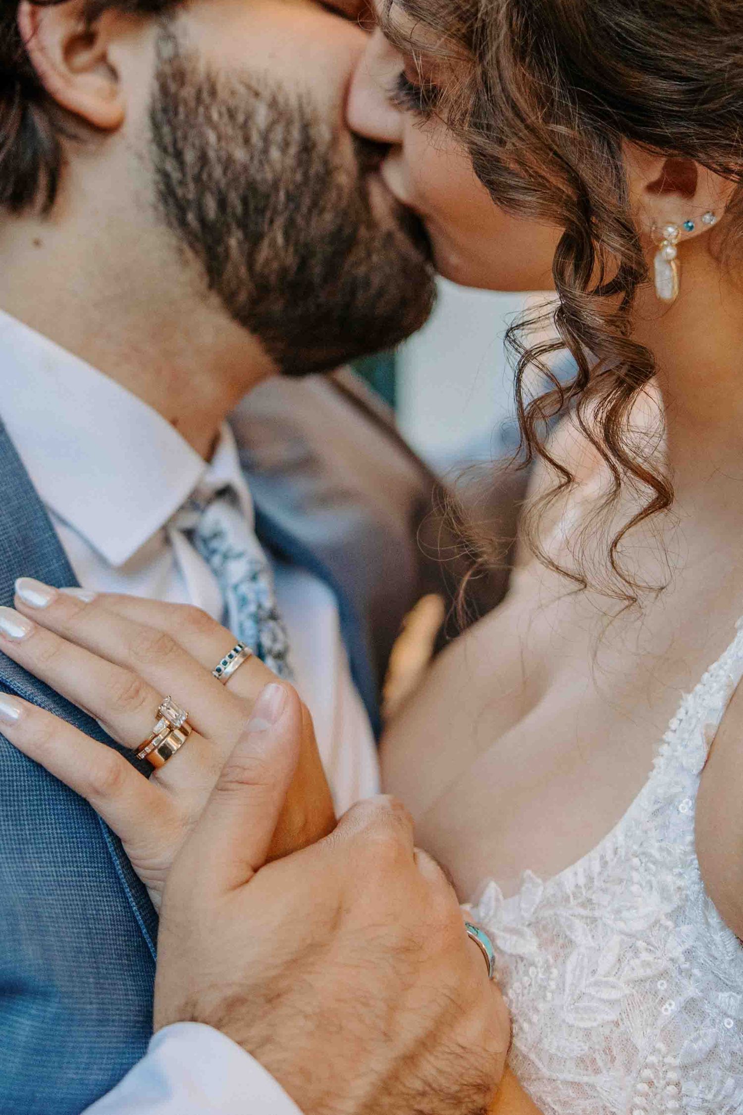 Close-up series of romantic wedding portraits showing tender moments and wedding rings.