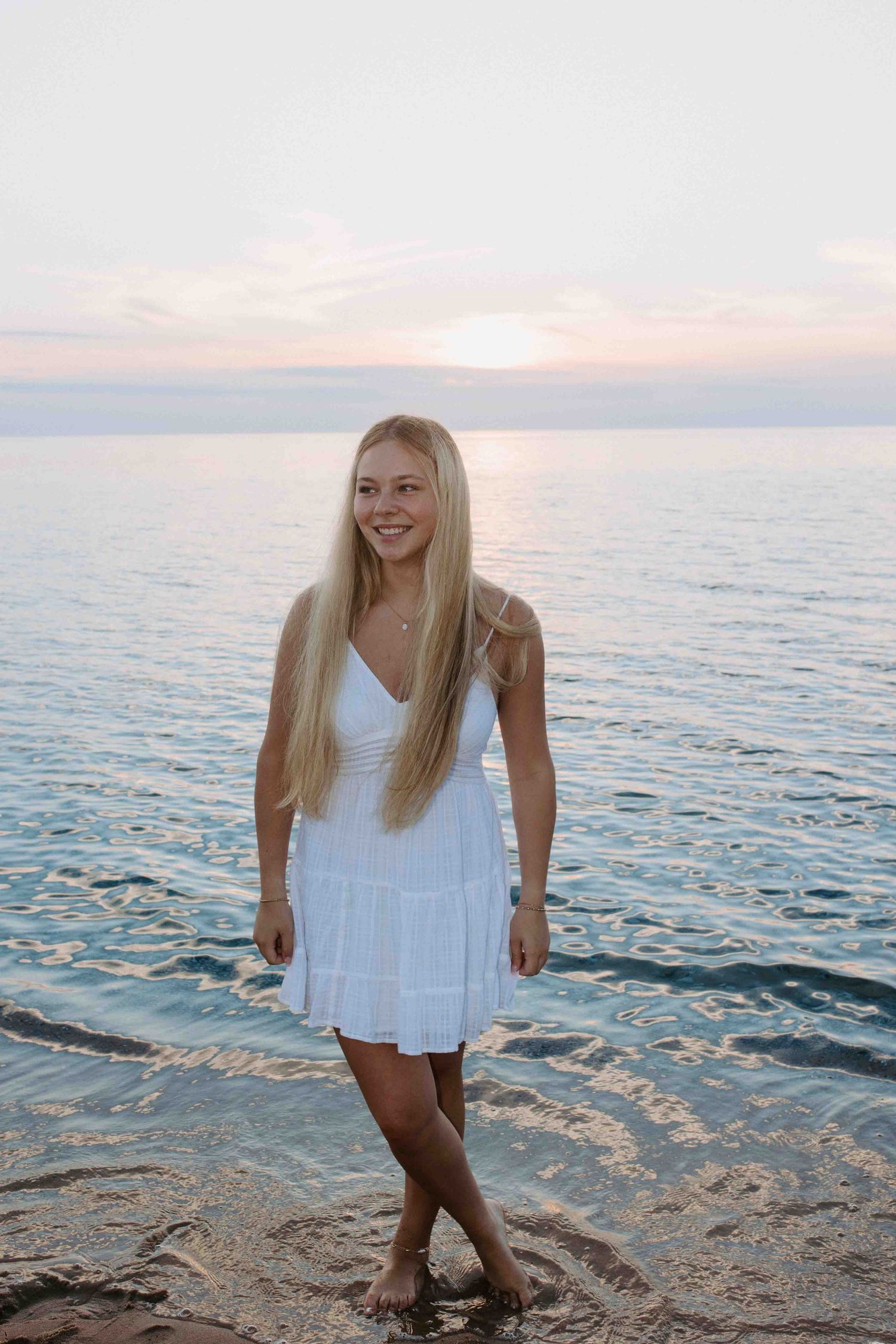 Candid moments photographed on a rocky beach during sunset.