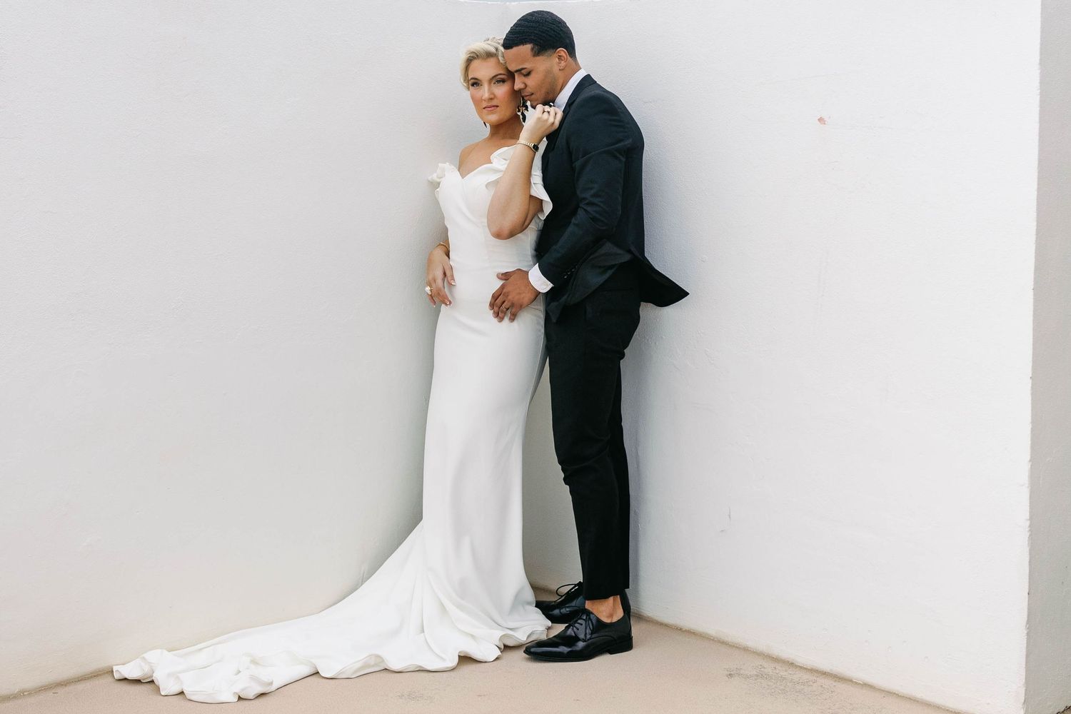 Modern minimalist wedding photography series against clean white backdrop.