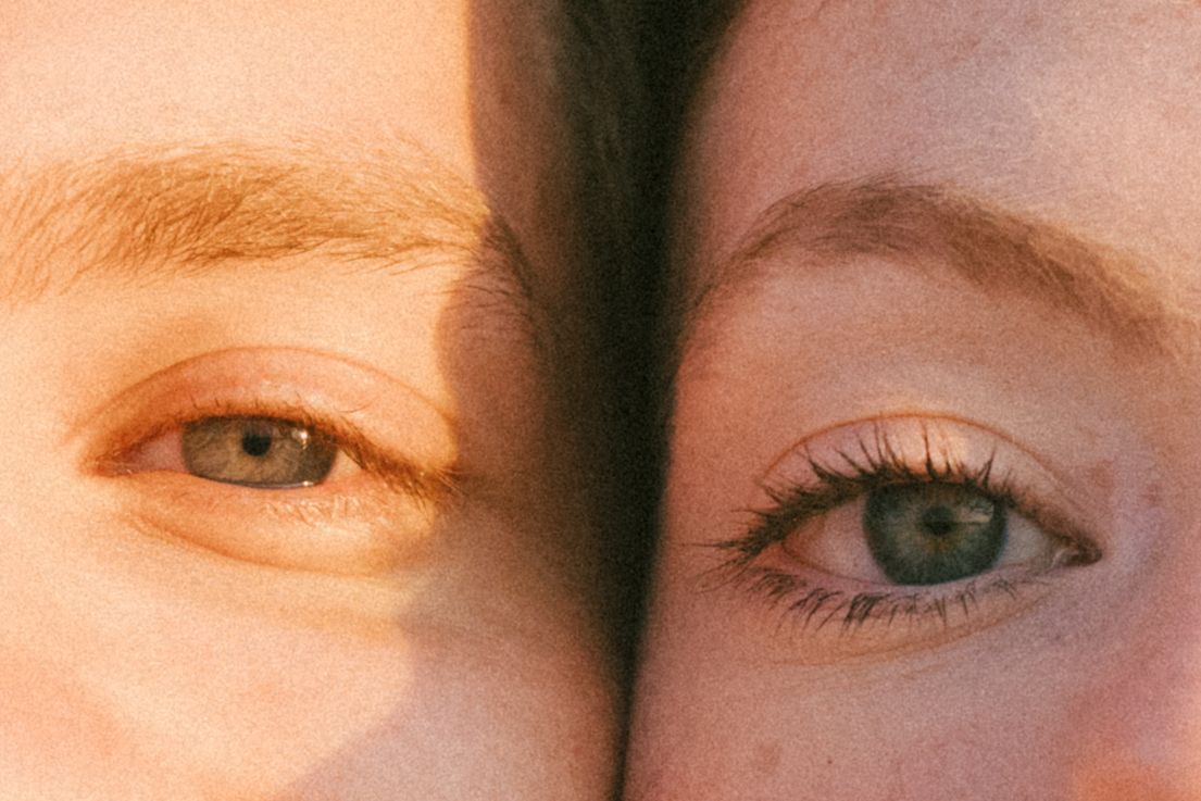 Extreme close-up of eyes in warm sunlight.