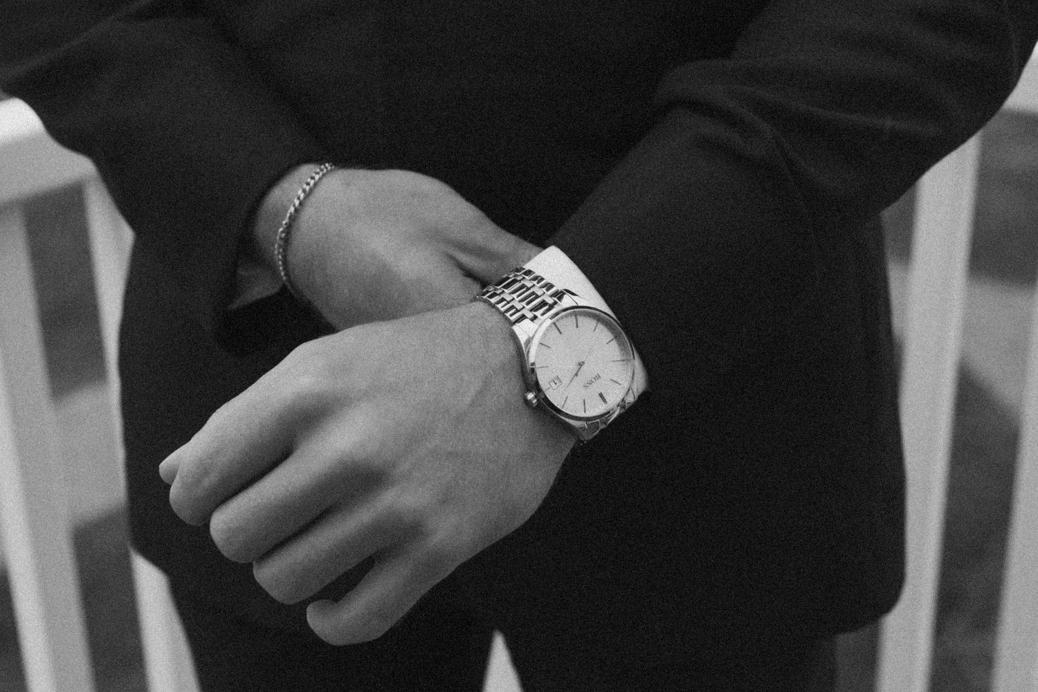 Formal black tuxedo jackets with white dress shirts and bow ties.