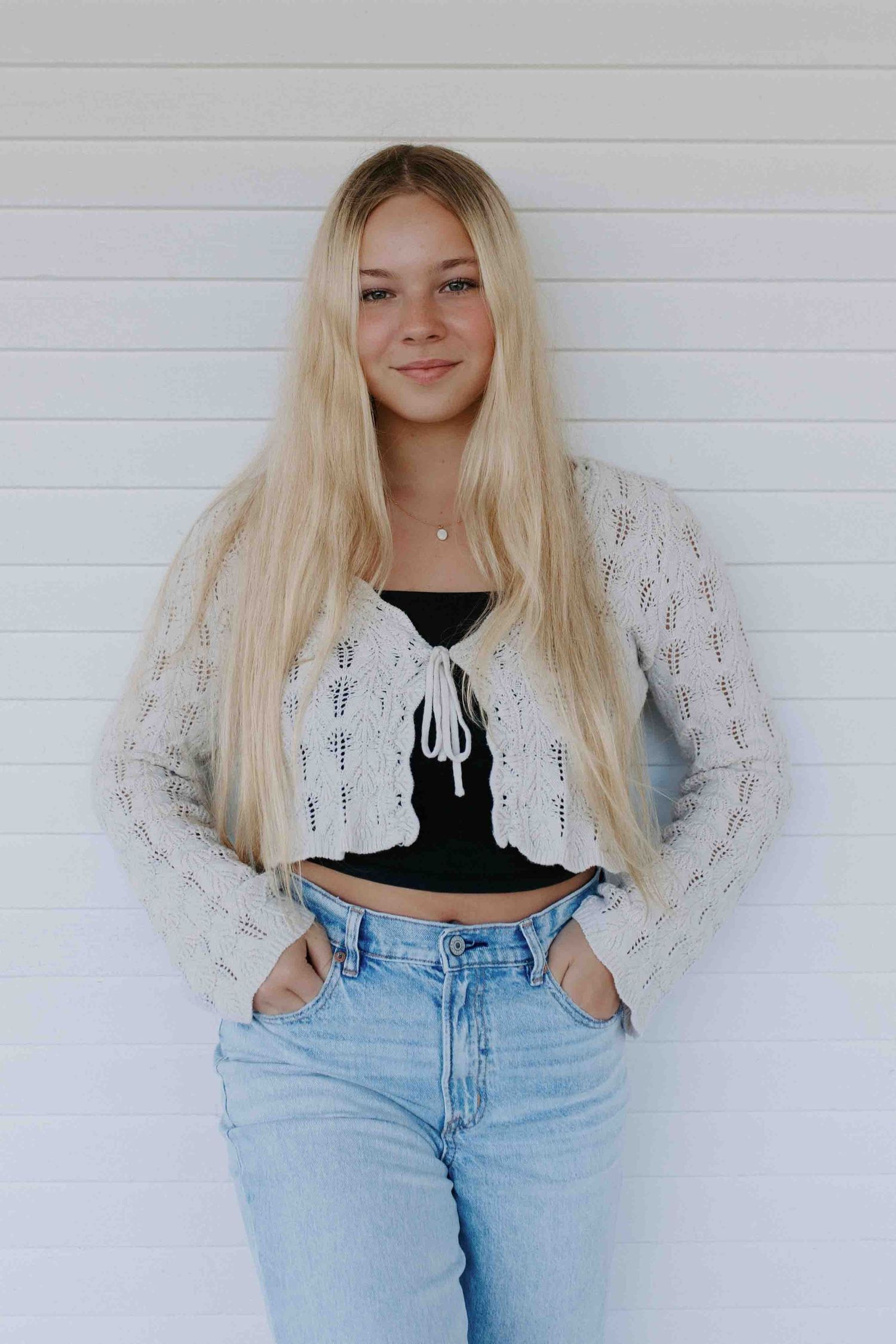 Fashion photo series against white wall showing casual summer style outfit.