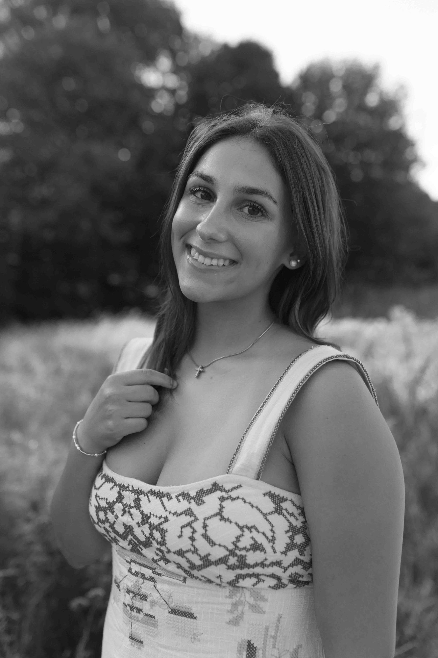 Black and white portrait series showing natural expressions and casual poses.