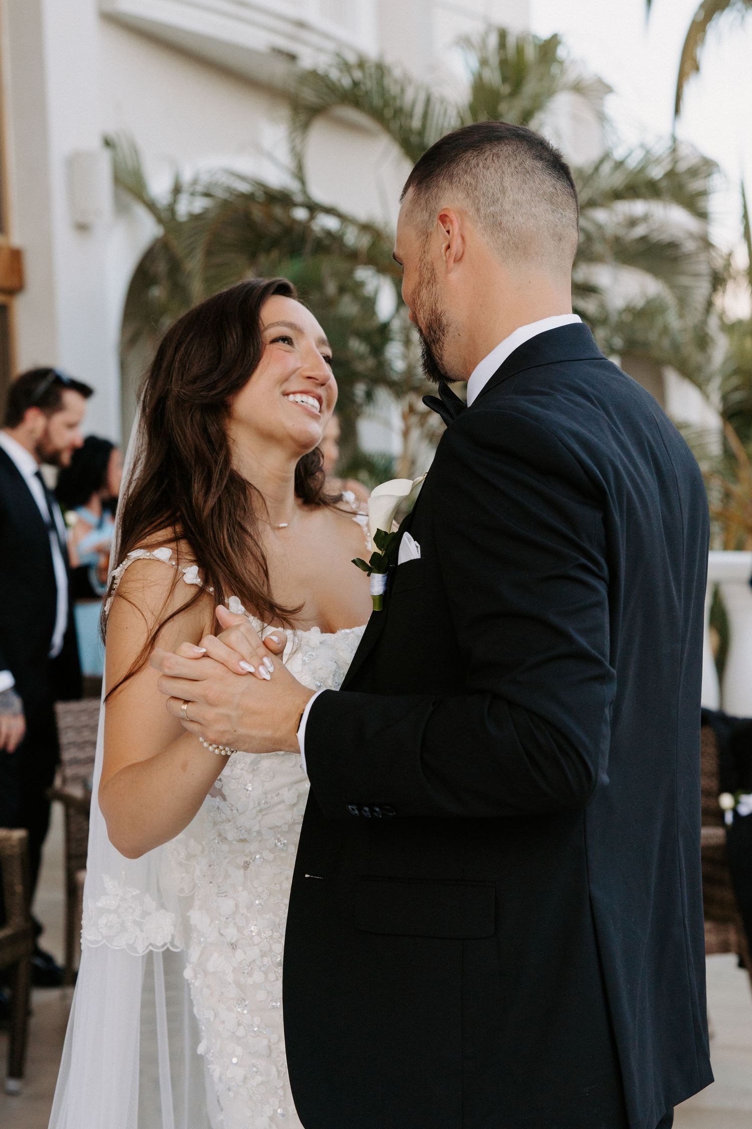 A romantic moment captured between newlyweds during their wedding celebration.