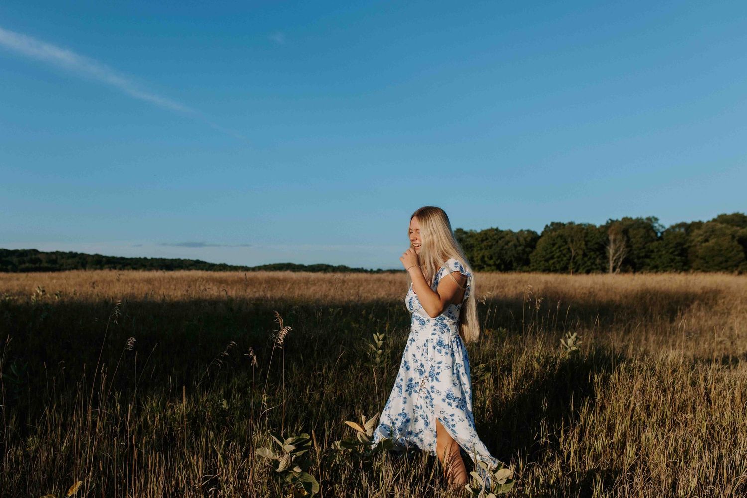 Joyful movement captured in a summer field at golden hour.