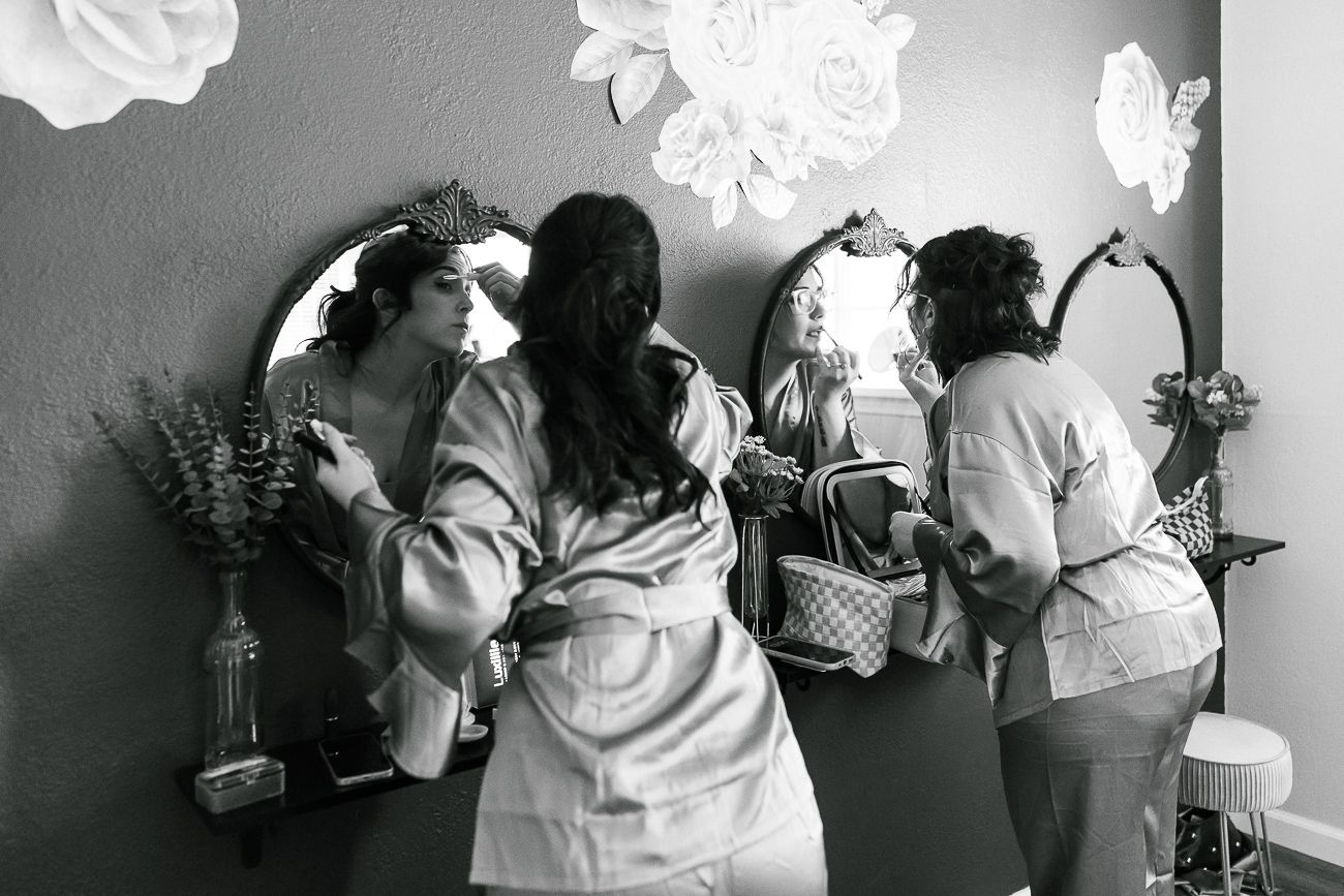 A series of black and white photographs showing nurses caring for patients in a medical setting.