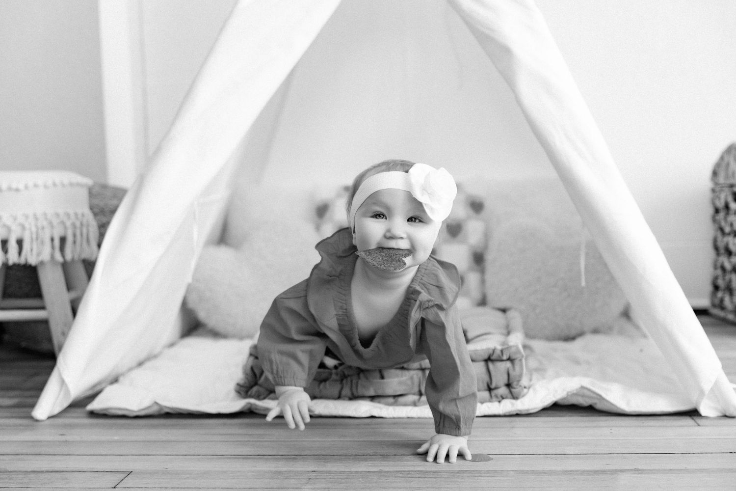 Series of shots showing playful moments under a white teepee tent.