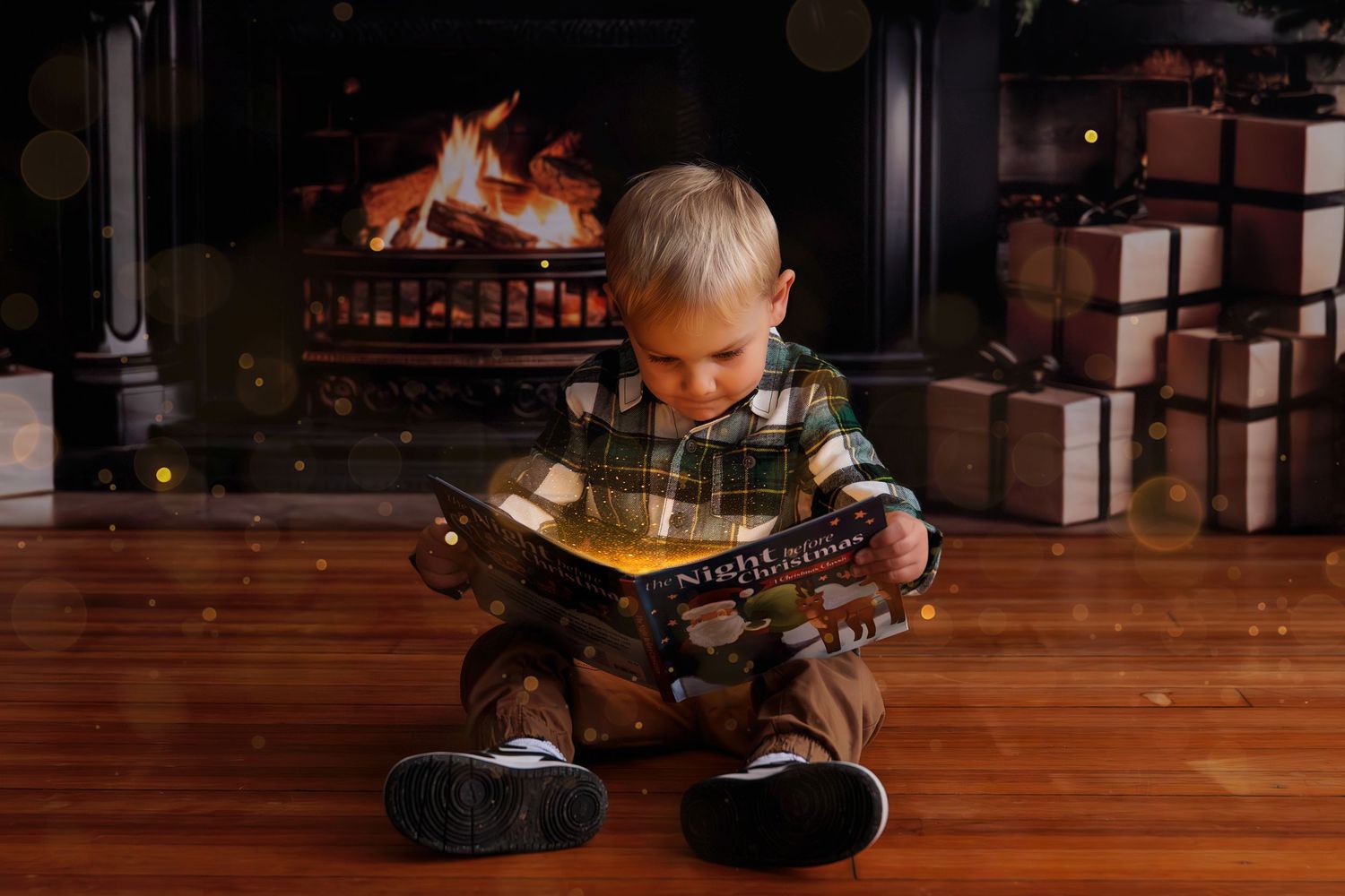 Child playing on wooden floor with holiday decorations in warm lighting.