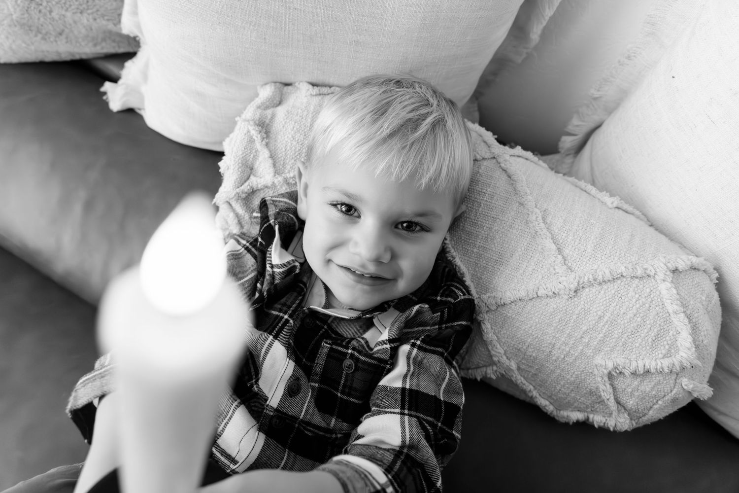 Candid black and white photos capturing relaxed moments on a white background.