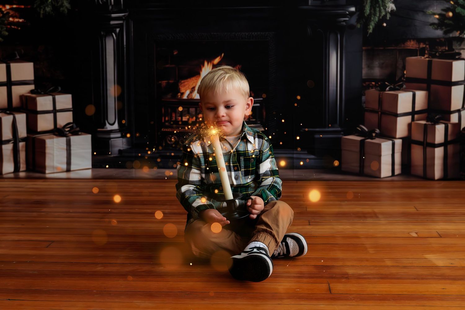 Holiday photos taken on wooden floor with Christmas tree and twinkling lights in background.