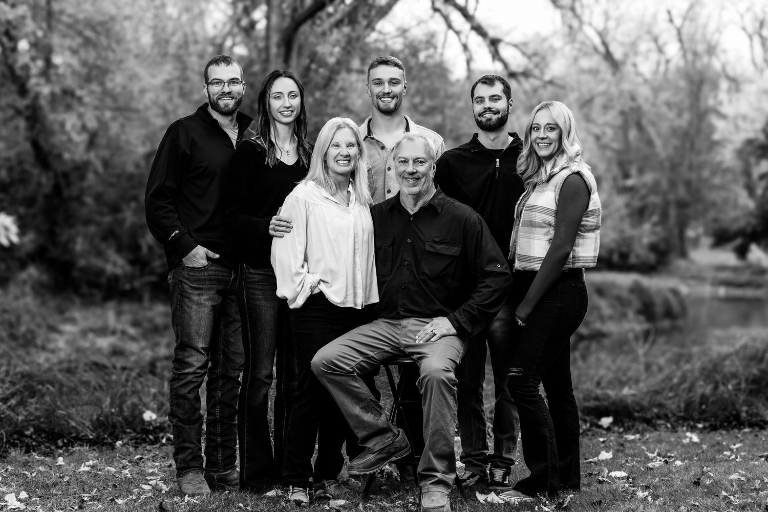 Black and white group photos taken outdoors during fall season.