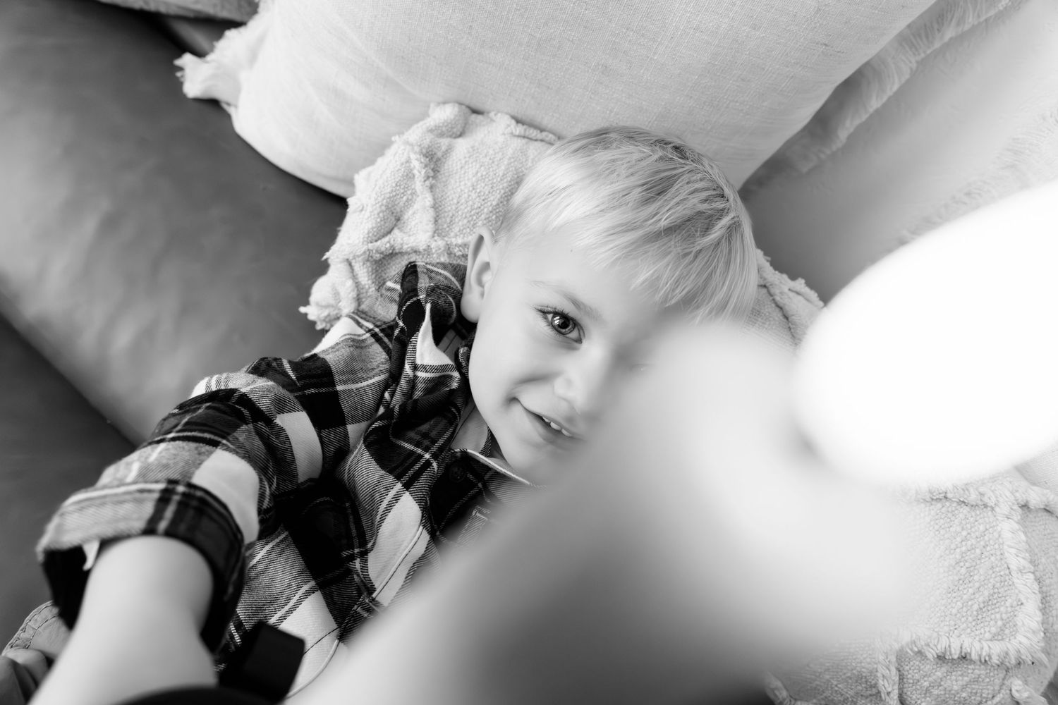 Artistic black and white holiday portraits with soft focus and natural expressions.