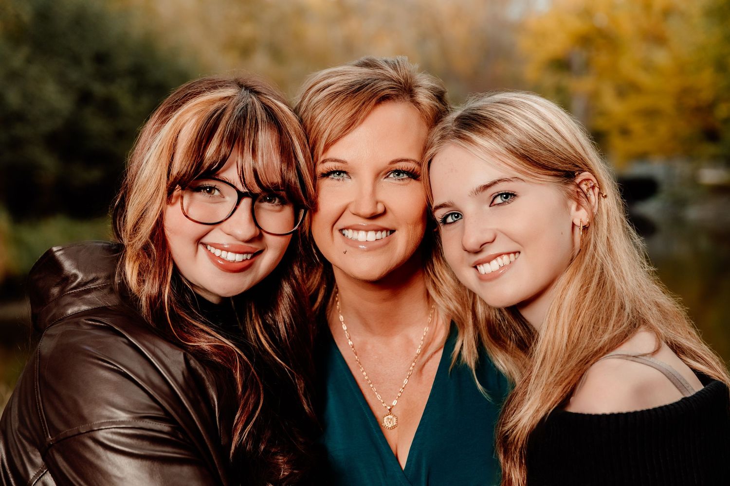 A series of candid outdoor photos showing people smiling and embracing in warm autumn lighting.
