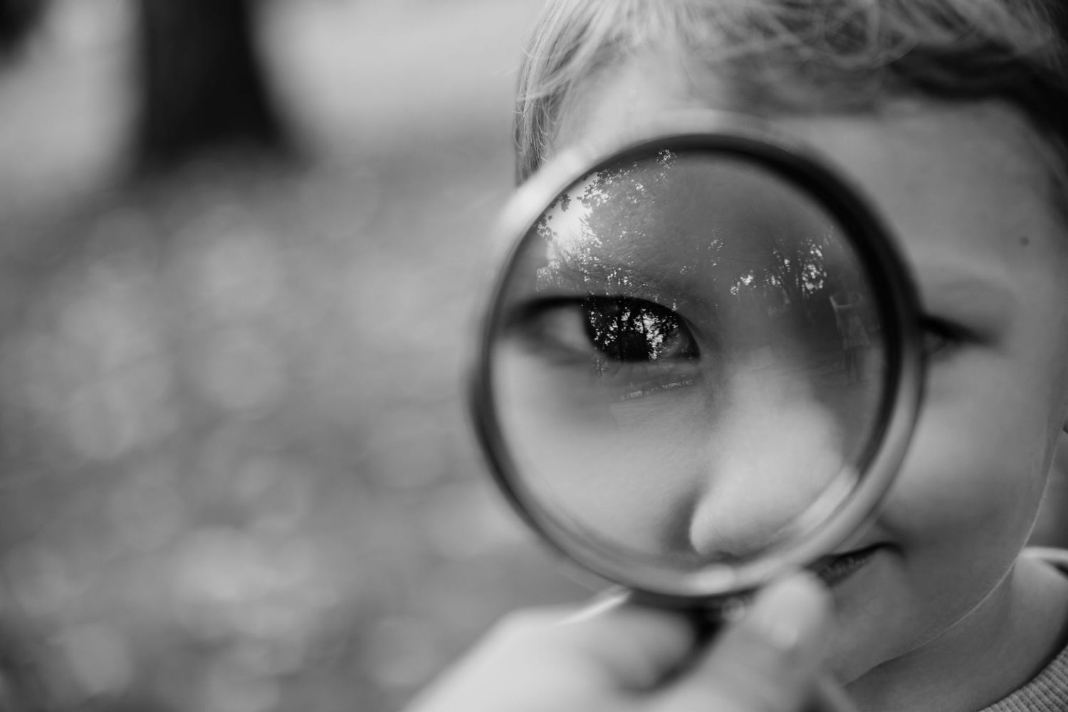 Close-up black and white portrait shots showing emotional expressions and details.