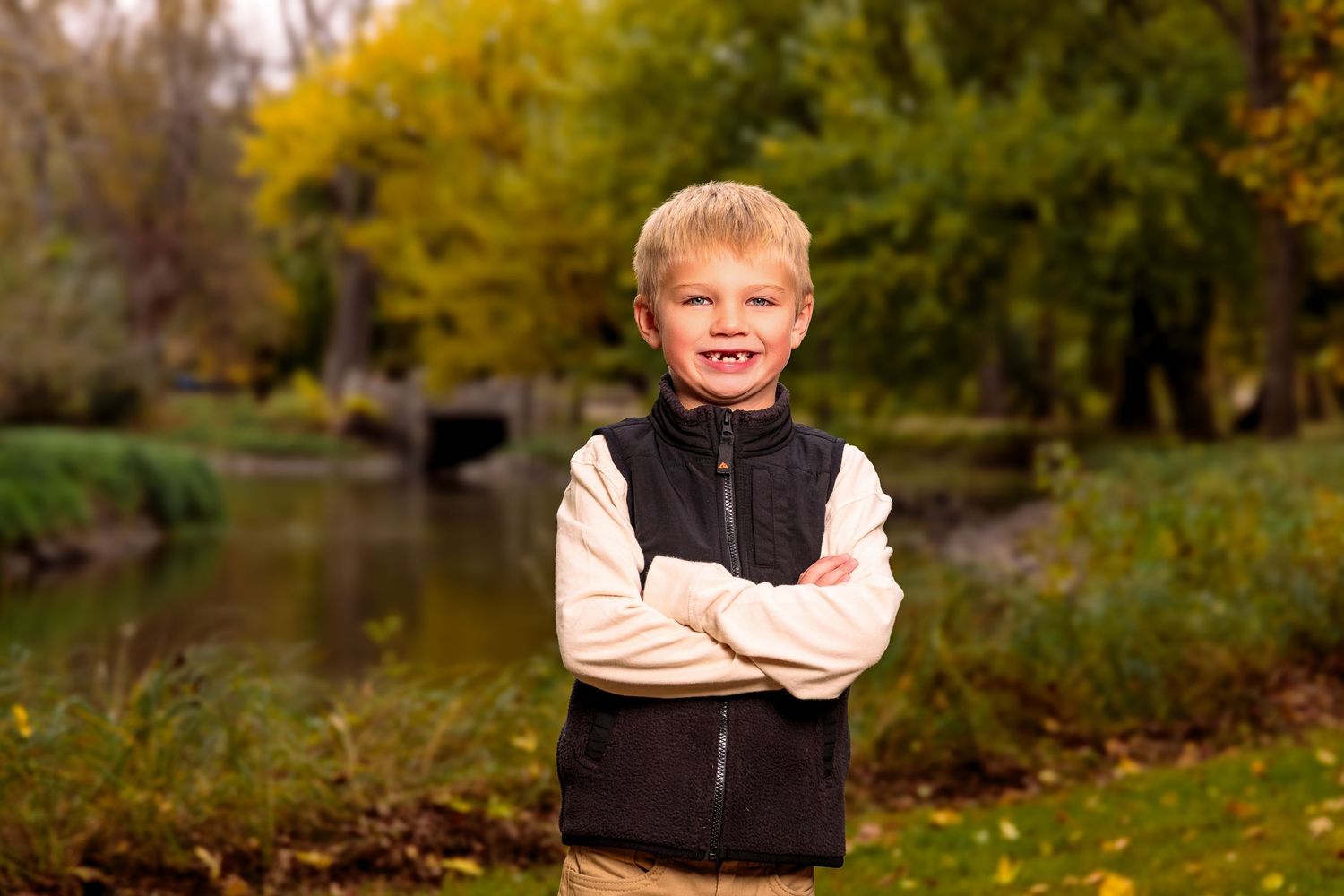 Children's portraits taken outdoors against an autumn backdrop with golden leaves and natural scenery.