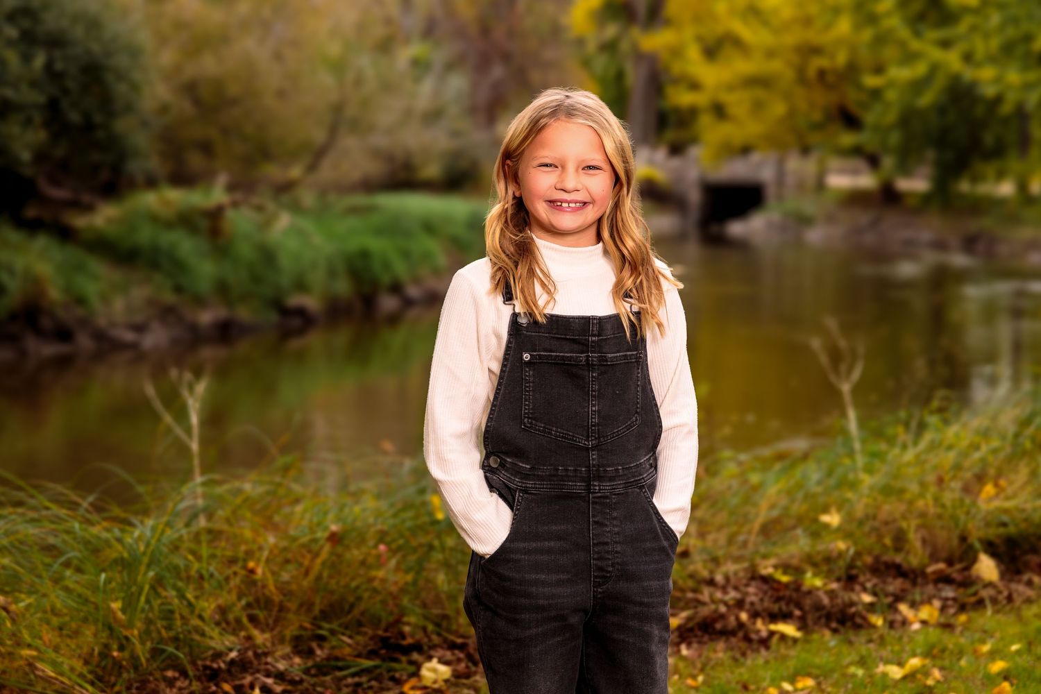A series of outdoor portrait shots in a natural autumn setting with fall colors and water in the background.