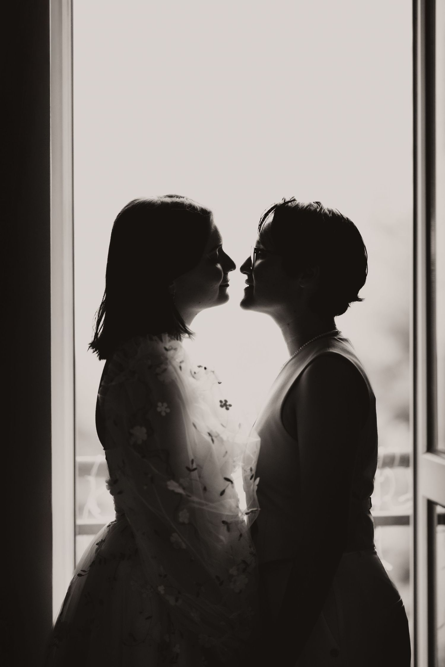 Natural portrait of couple during emotional eszküvői fotózás. LGBTQ+ Wedding photos in Budapest.