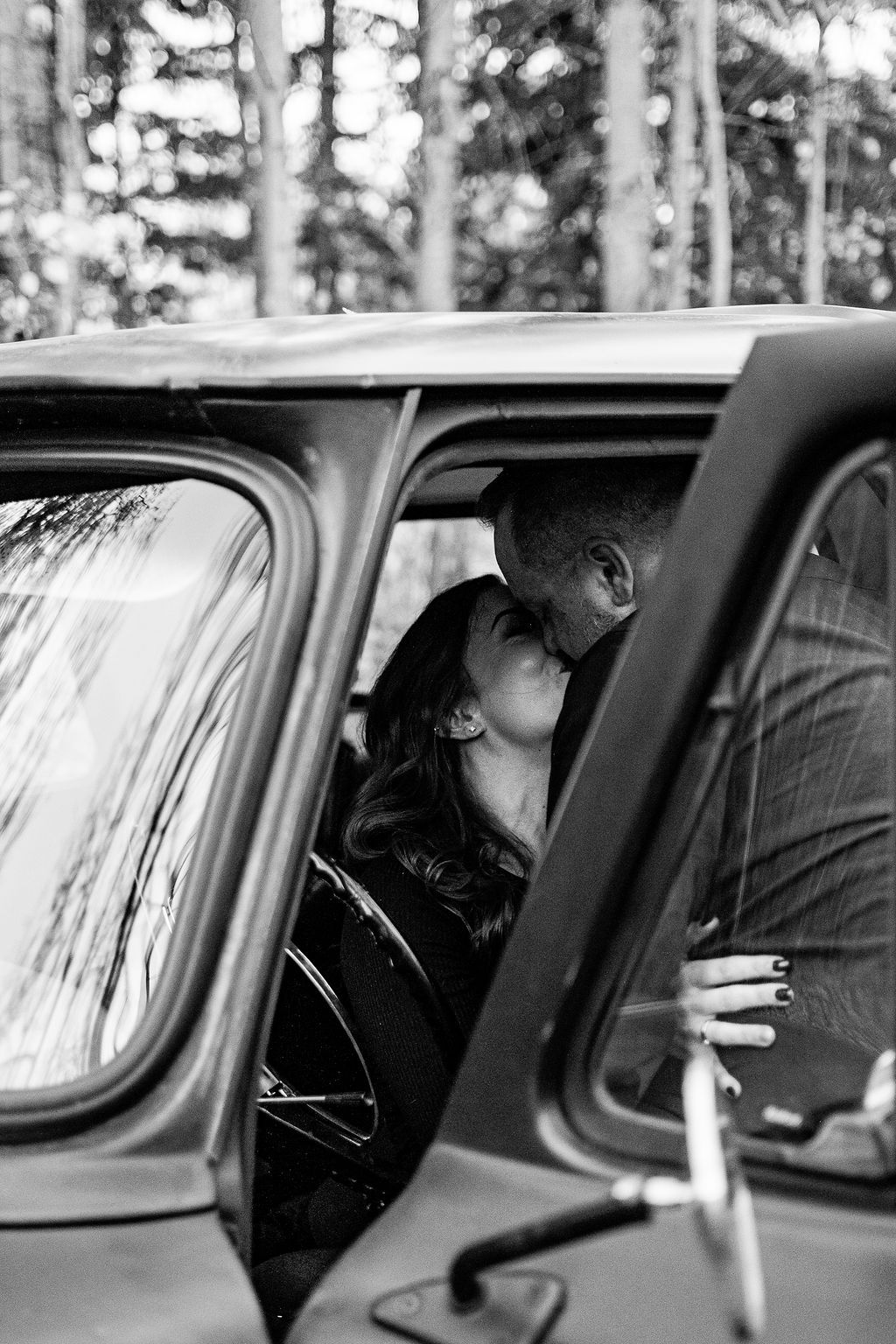 Sequence of black and white photos showing a car window view with blurred trees in the background.