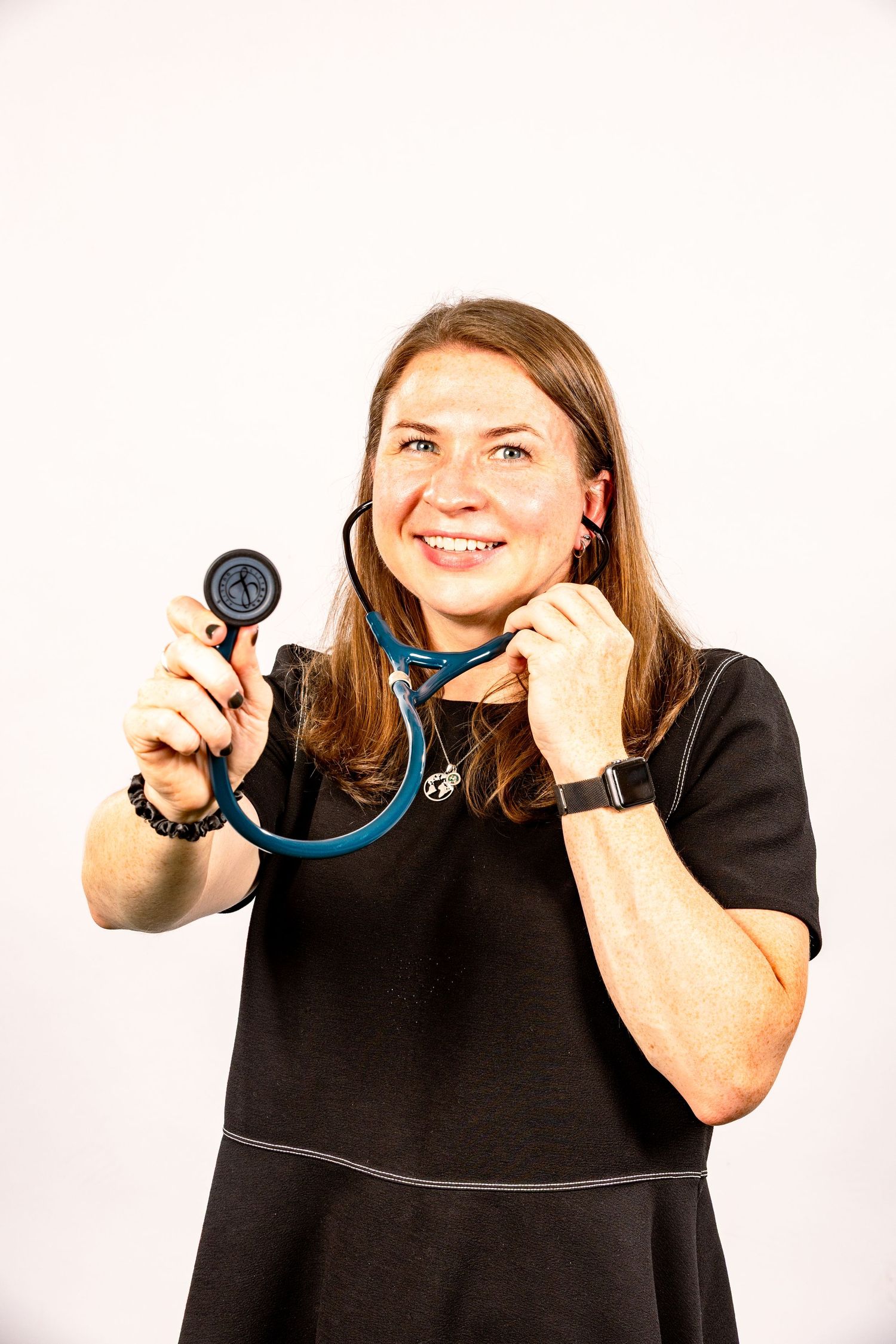Playful series demonstrating use of medical stethoscope in various positions.