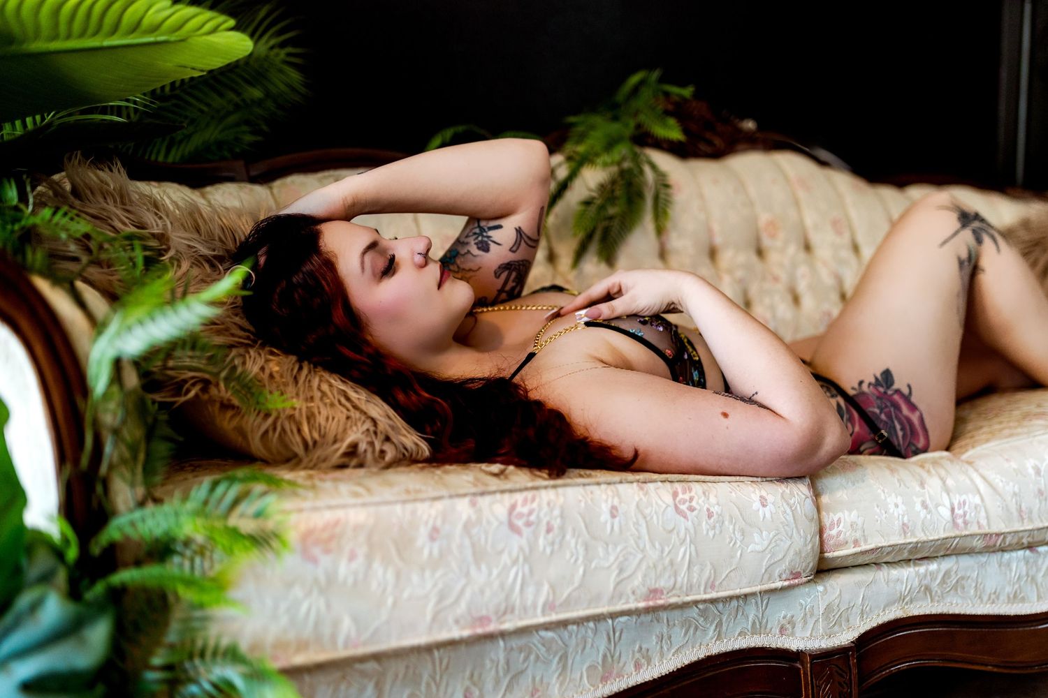 Tropical ferns and greenery frame a relaxing scene at a luxury spa and wellness retreat.