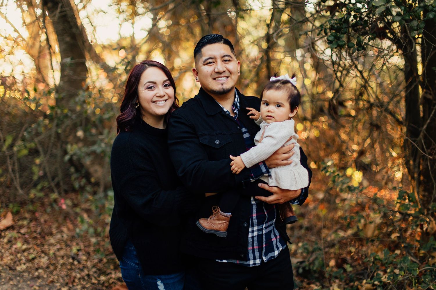 Four outdoor portraits in warm autumn sunlight showcasing natural interactions between figures among fall foliage.