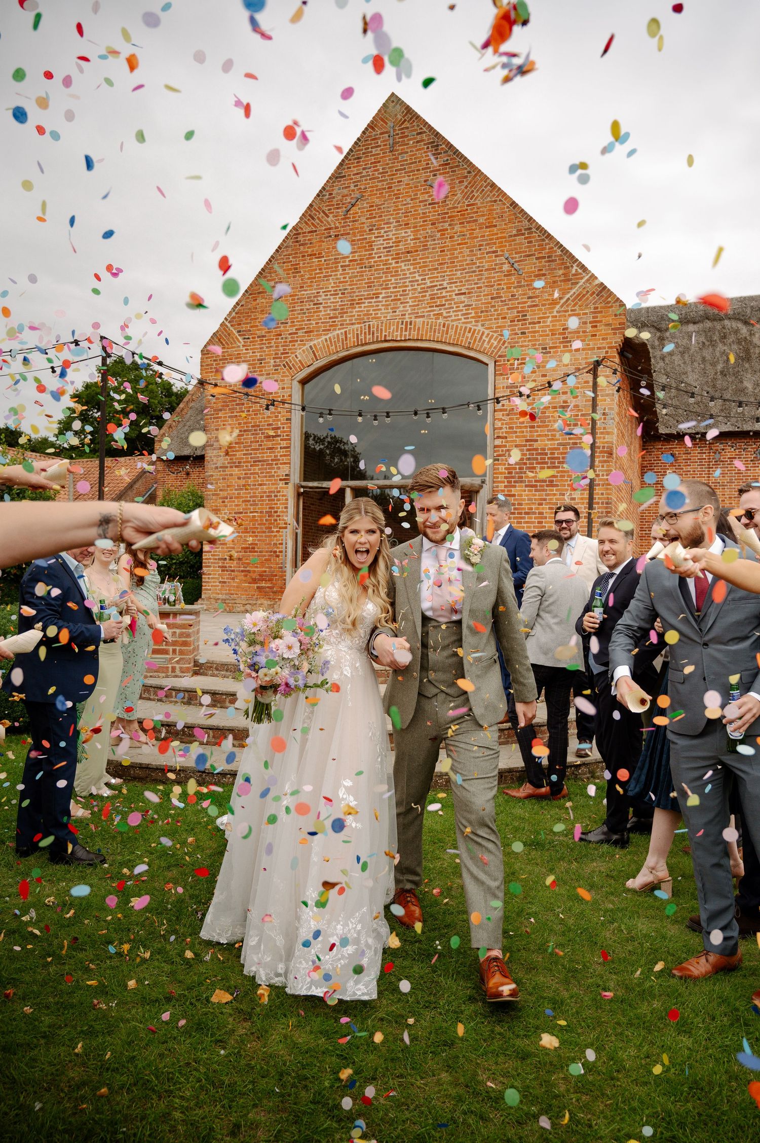A wedding celebration sequence showing joyful moments with confetti flying through the air outside a brick church building.