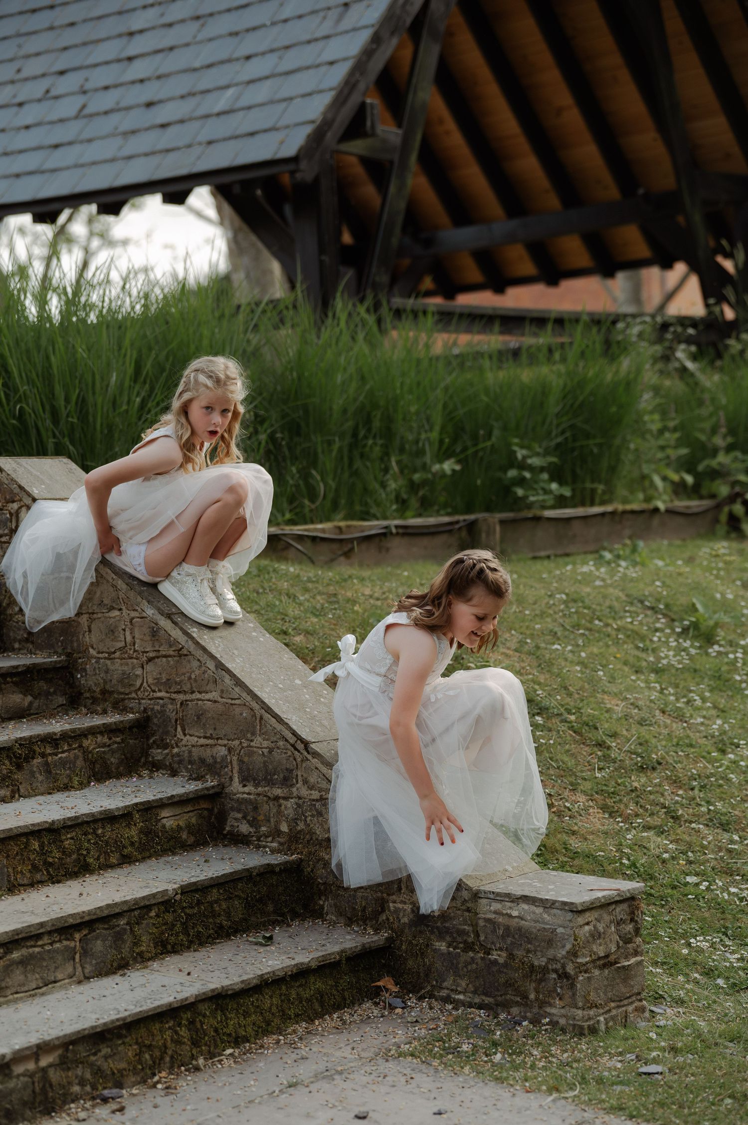 A sequence of photos showing a person in a white wedding dress sitting on stone steps outdoors.