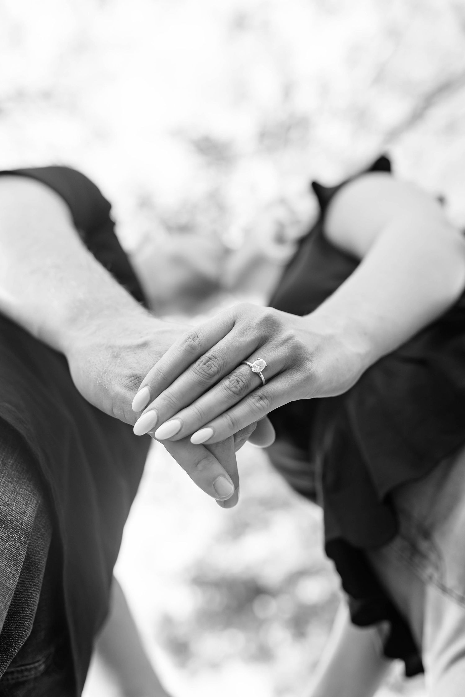 MAN AND WOMAN KISS IN BACKGROUND OF RING