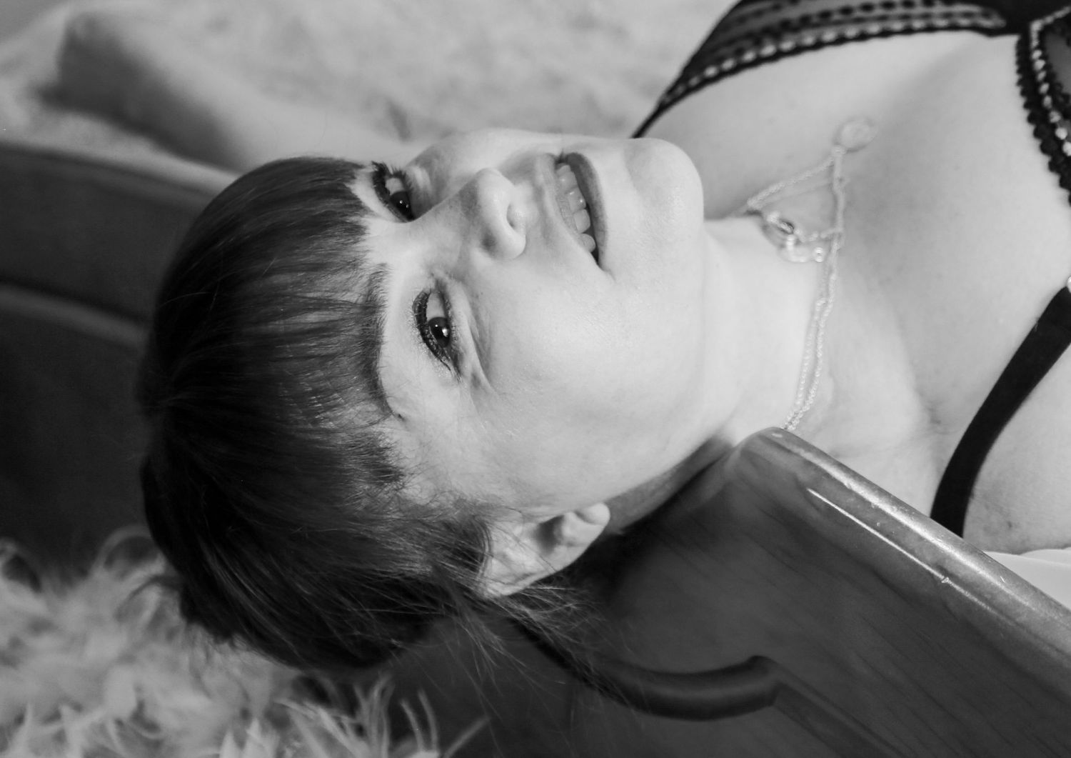 The stunning Tanya black and white, off the edge of the bed, luxury boudoir, body confidence session