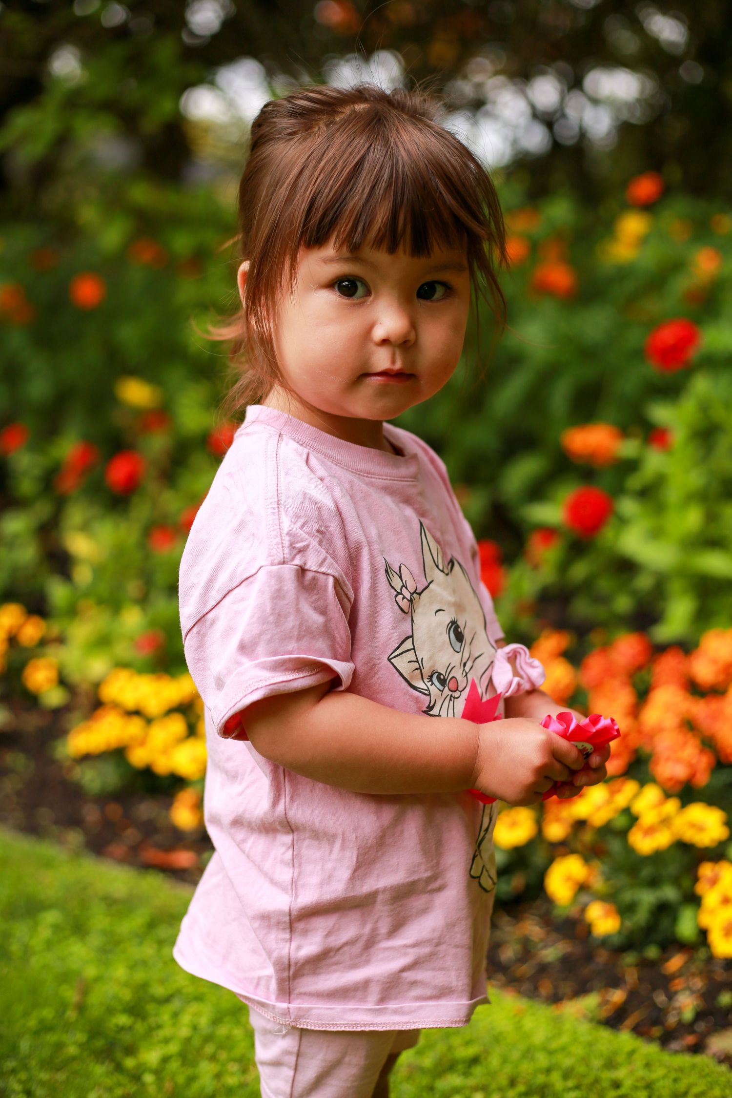 Ariella in flower garden candid shot