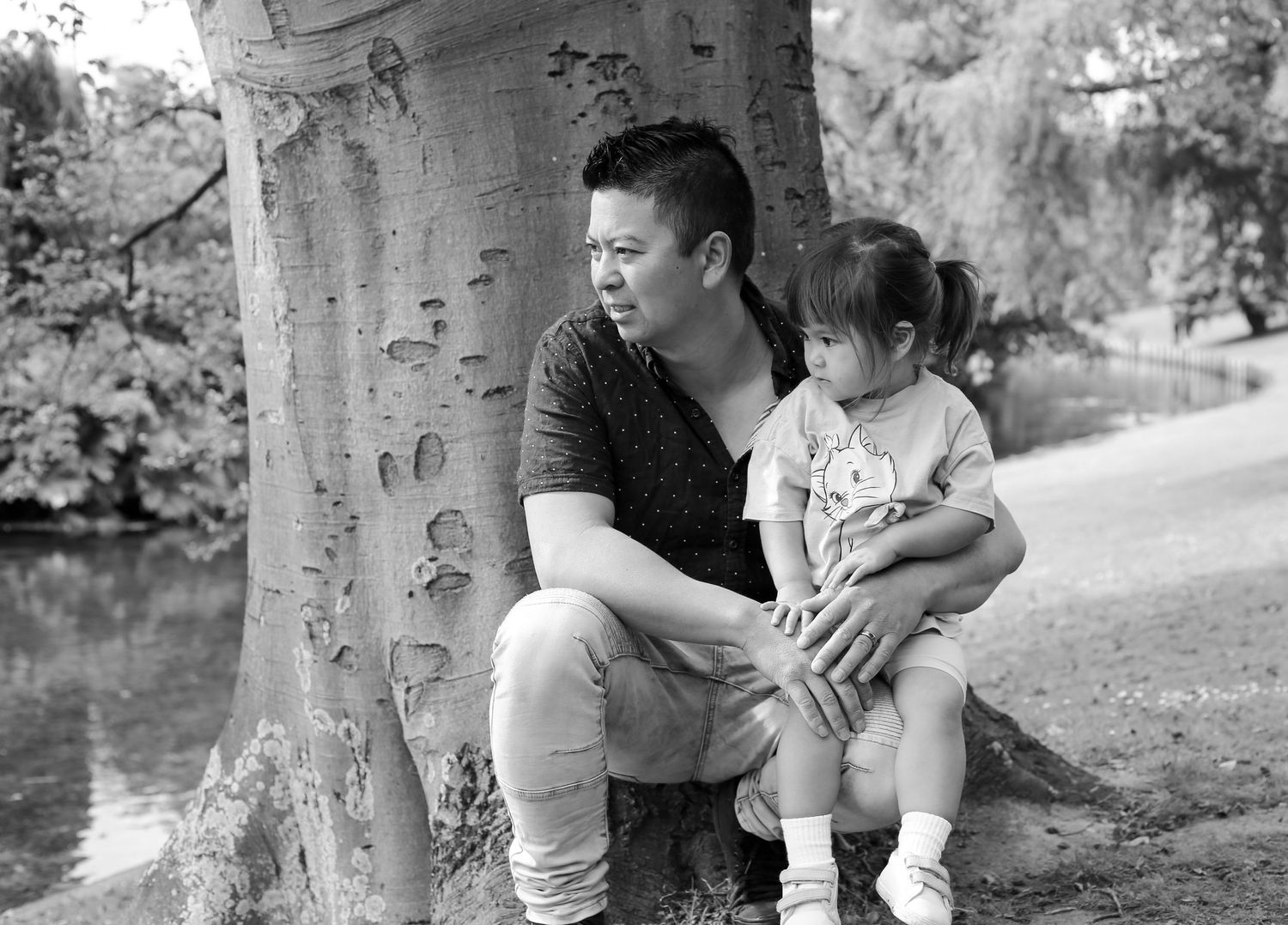 Spending time with my Dad, black and white of child and dad watching the ducks