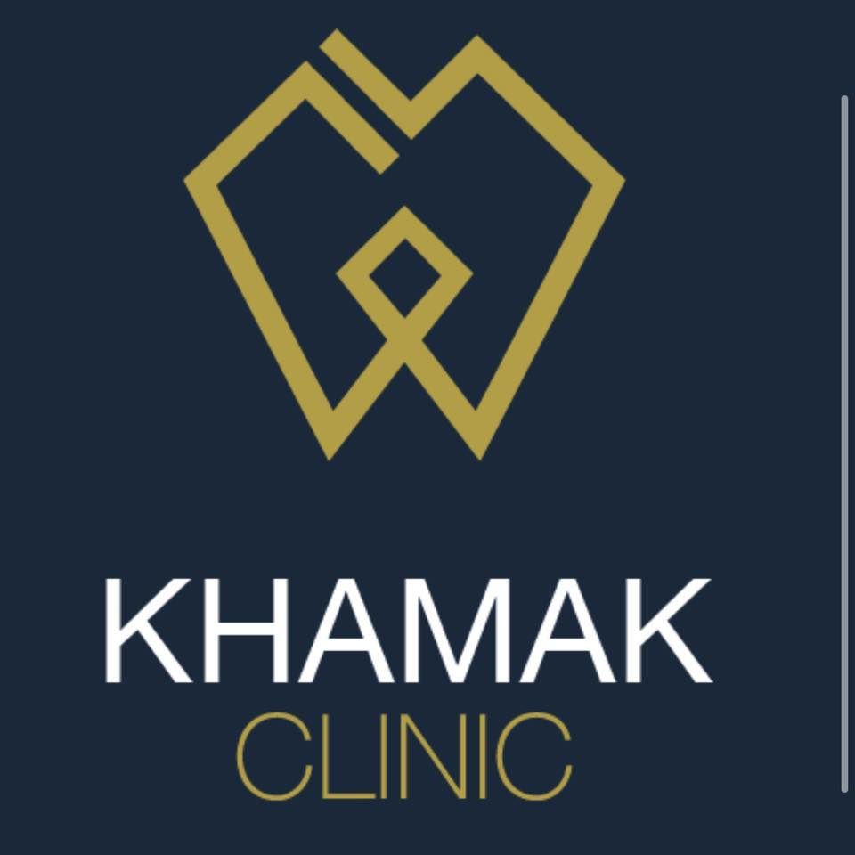 Logo animation for Khamak Clinic showing abstract geometric gold shapes on a dark blue background.