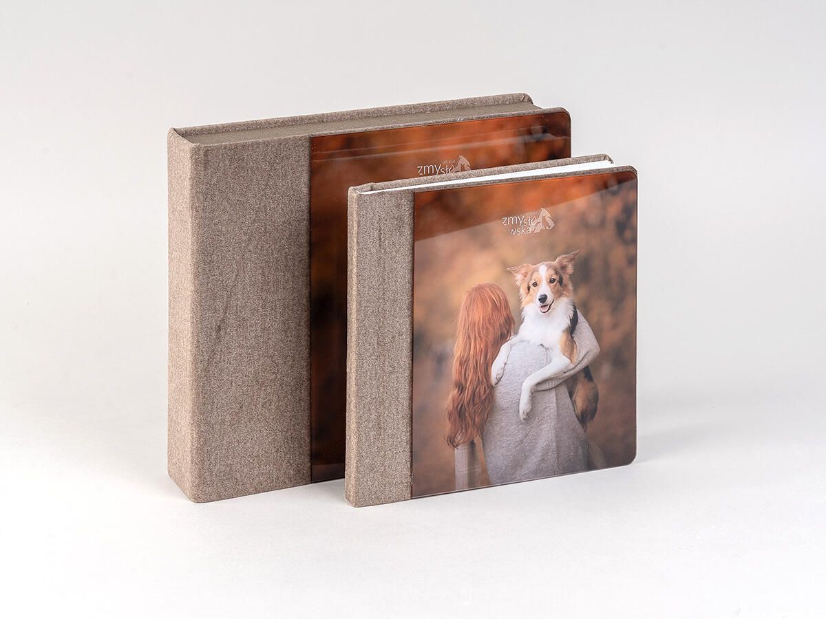 Concrete block photo holders display a sepia-toned portrait in a minimalist industrial design arrangement.