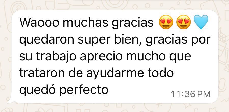 A WhatsApp message in Spanish expressing gratitude, with heart and smiling emoji icons.